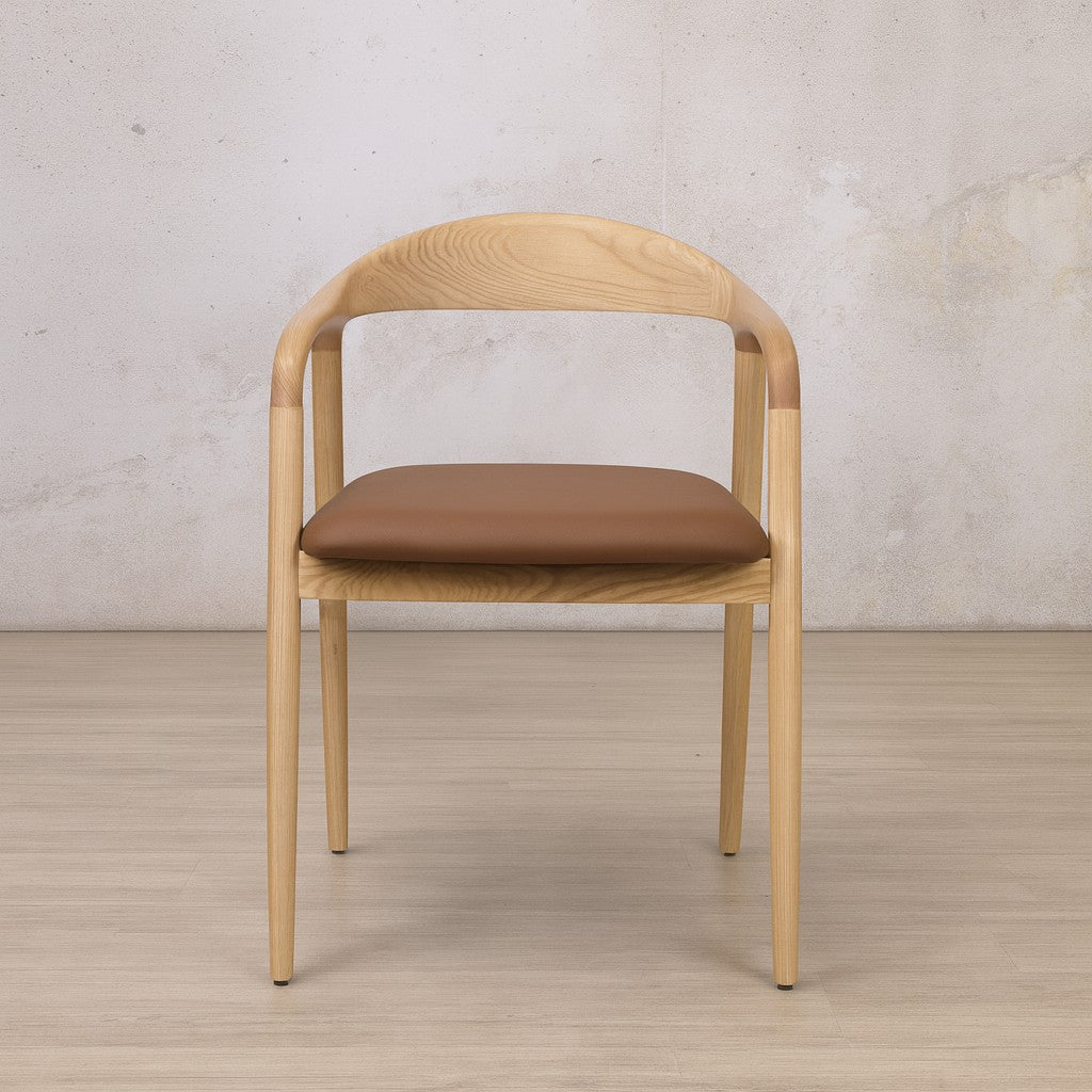 Front view of the Alden Leather Dining Chair in a natural wood finish. | carver dining chair, dining chairs, modern dining chairs south africa
