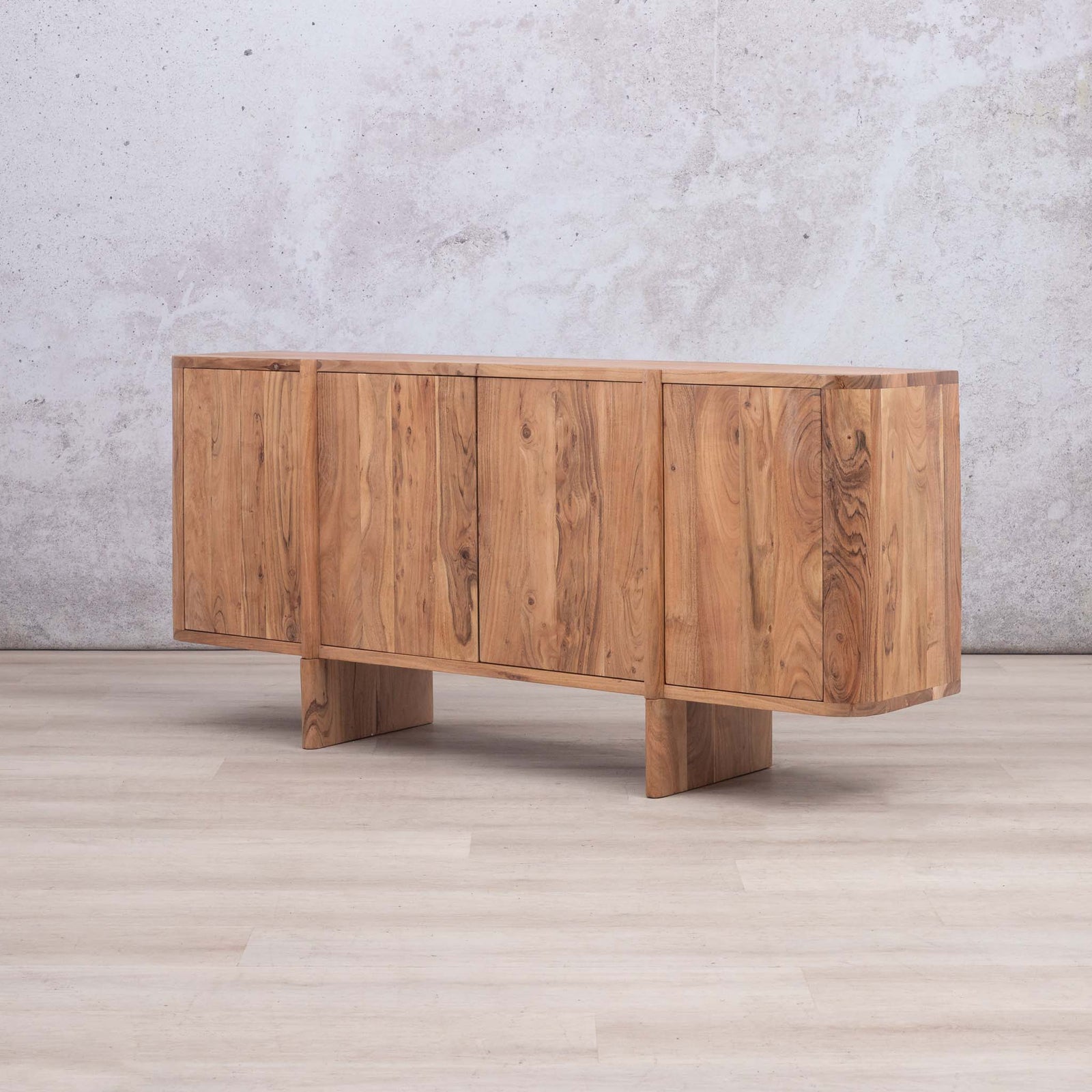 Leather Gallery Baltic Sideboard in Acacia wood, featuring four doors, block-style legs, and a warm natural finish.