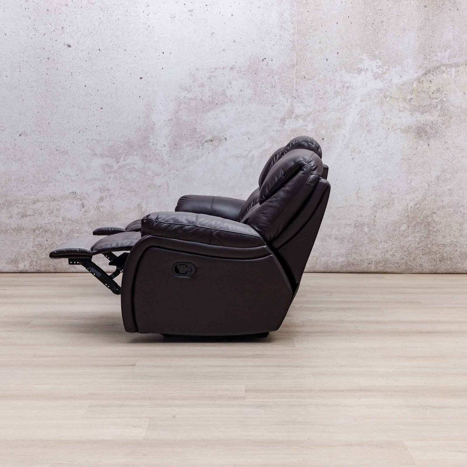 Side view of the Leather Gallery Cairo 3 Seater Leather Recliner in Choc, shown with the footrest extended.