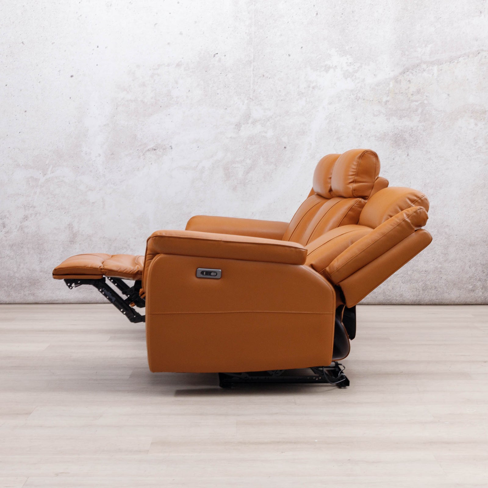 Leather Gallery Carter 3 Seater Leather Recliner in Tan, shown with the footrest extended.