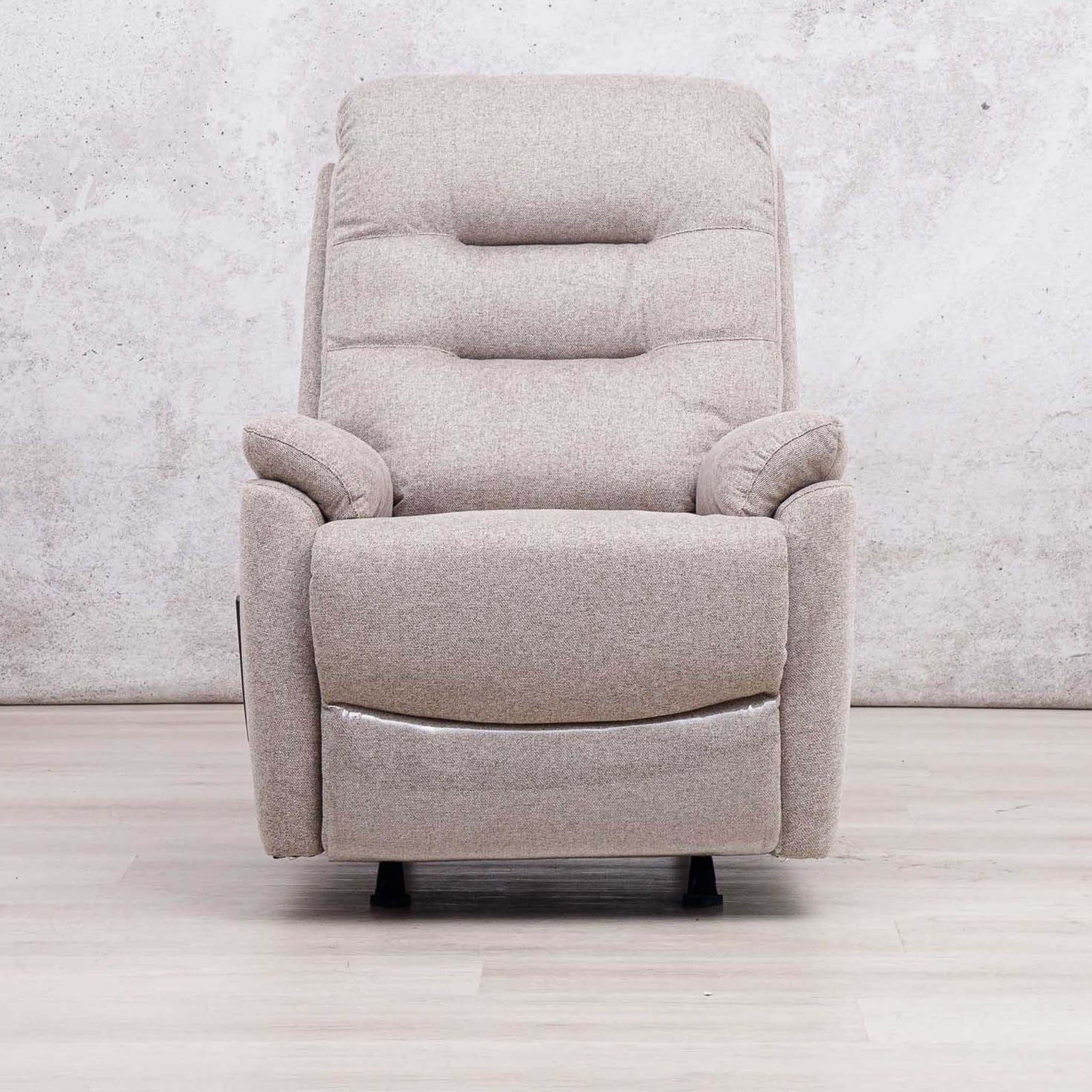Close-up of the Leather Gallery Dallas Fabric Rocker Recliner Chair in Beige, showing woven fabric texture and visible stitching.