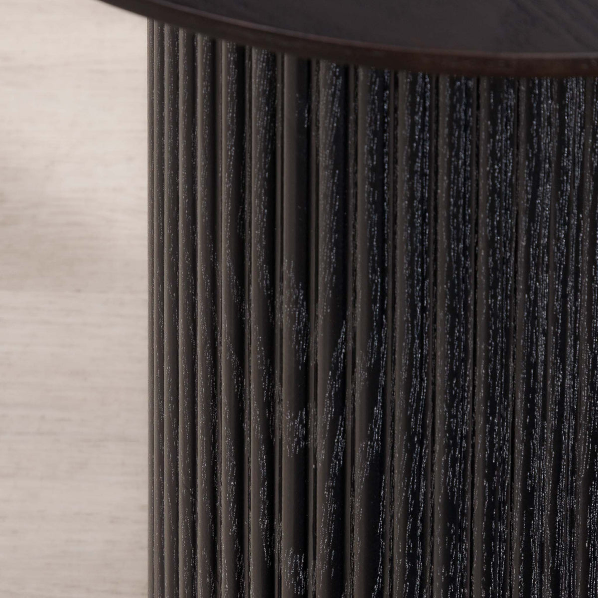 Helmsley Coffee table in a rich black hue, shown as an accent piece in a stylish living room. | Coffee tables, coffee tables for sale, round coffee table, wood coffee table