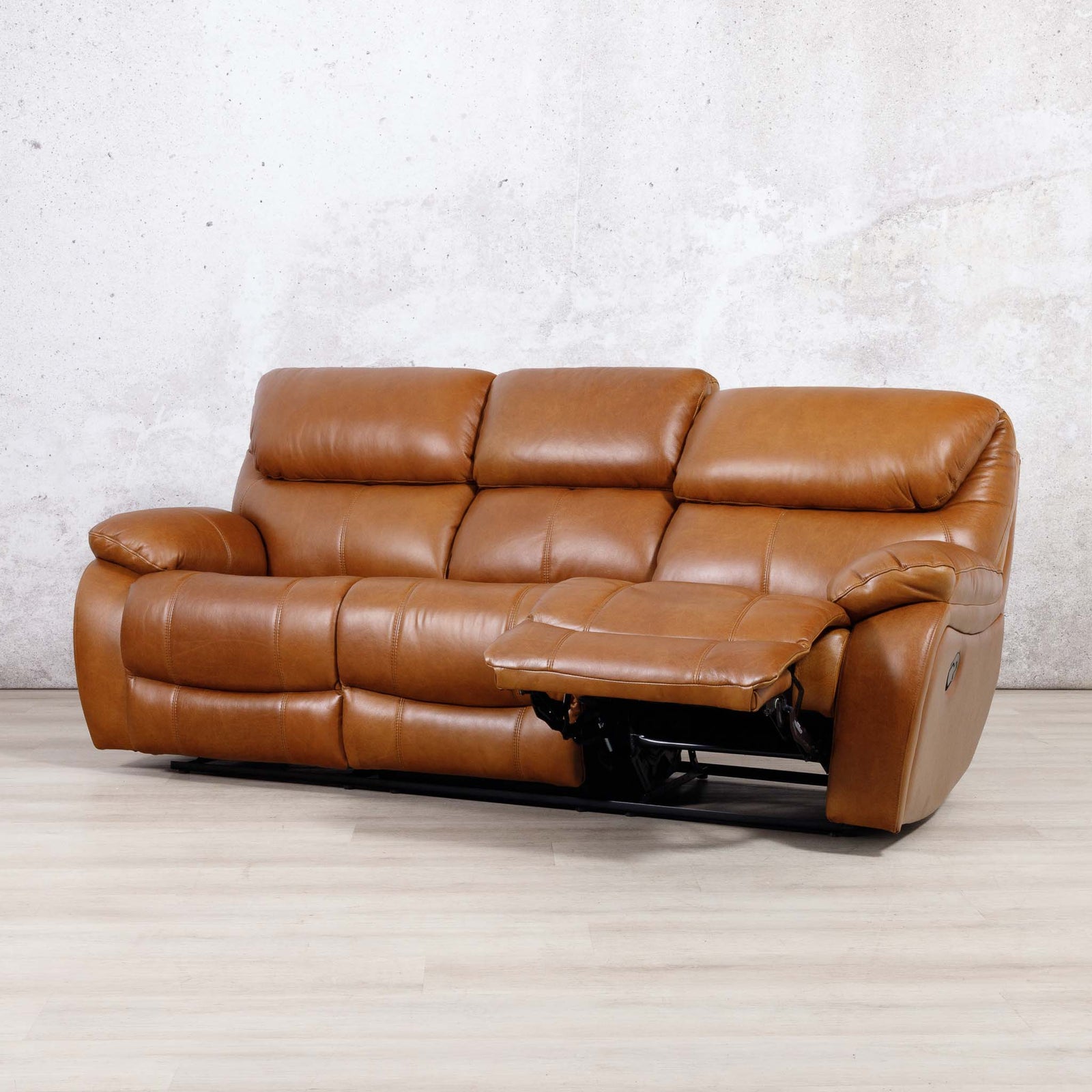 Leather Gallery Kuta 3 Seater Leather Recliner in Czar Pecan, shown with the centre footrest extended.