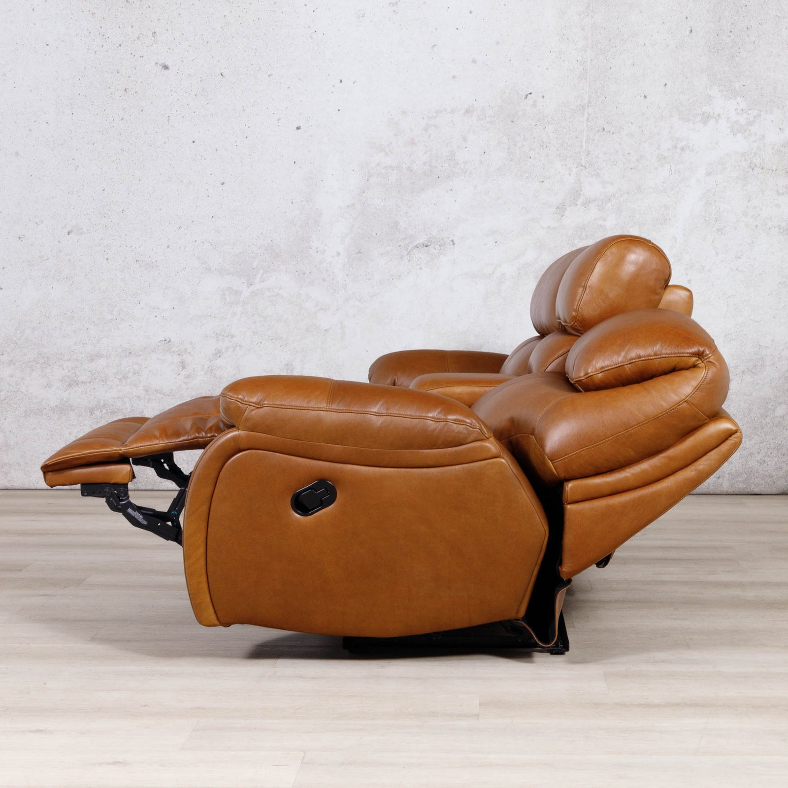 Side view of the Leather Gallery Kuta 2 Seater Leather Recliner Home Theatre in Czar Pecan, shown with the footrest extended.