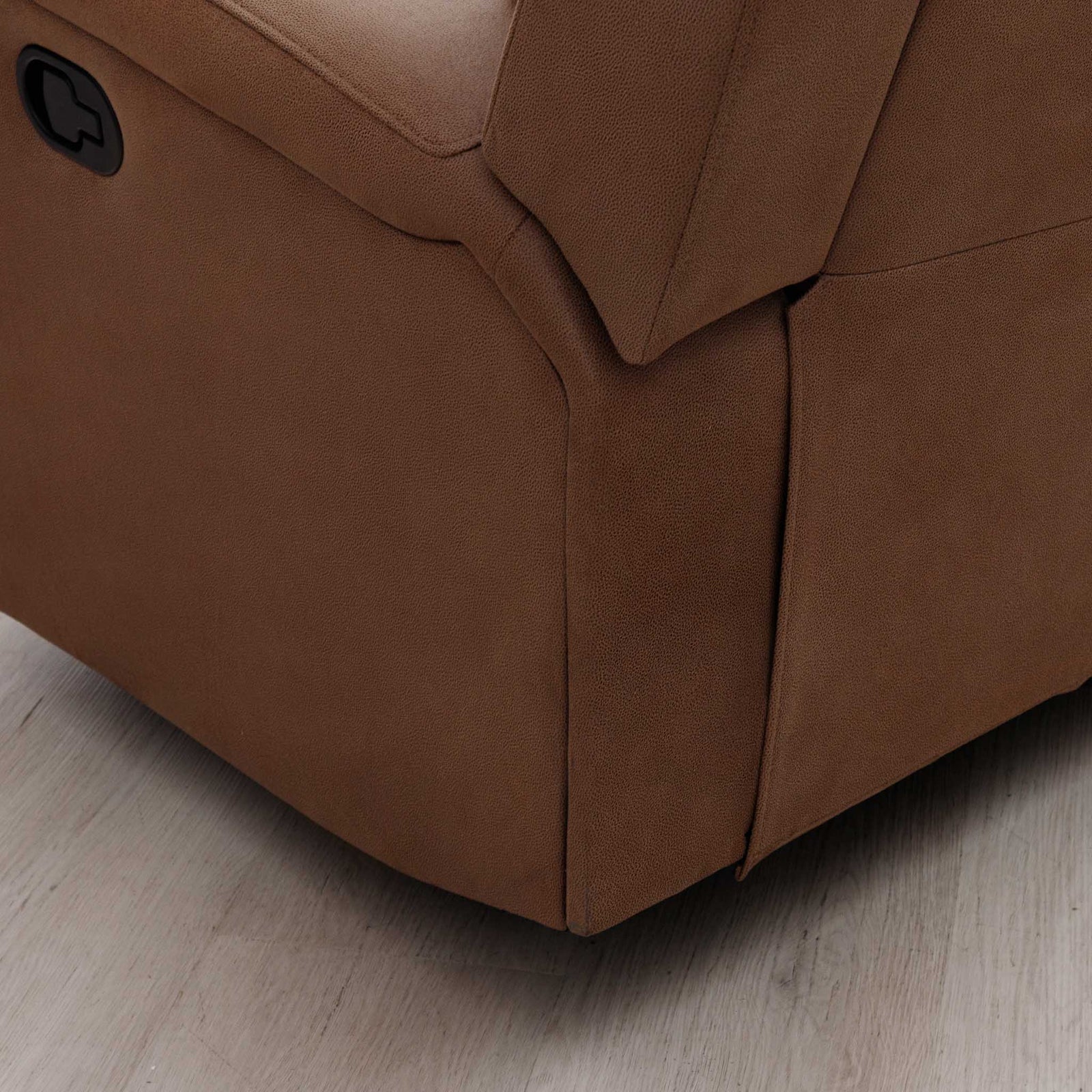 Close-up of the Leather Gallery Orlando 1 Seater Fabric Recliner in Desert Sand, showing the side panel, armrest, and black recliner control button.