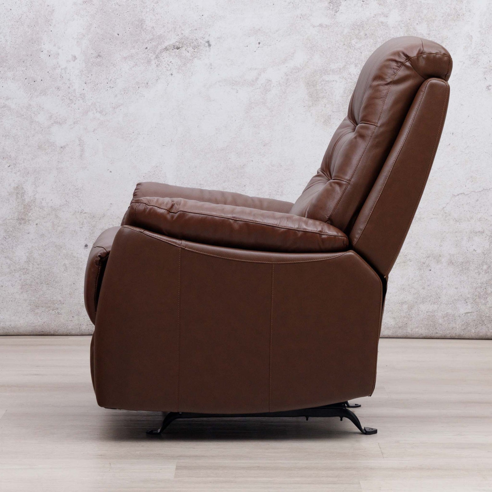 Side view of the Leather Gallery Dallas Leather Rocker Recliner Chair in Saddle, showing its leather upholstery and recliner profile.