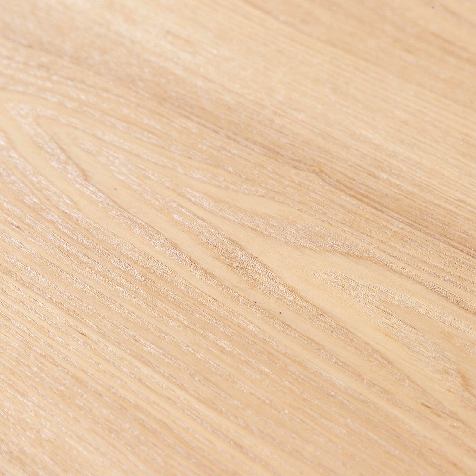 Close-up of Beckett dining table's natural wood grain tabletop surface.
