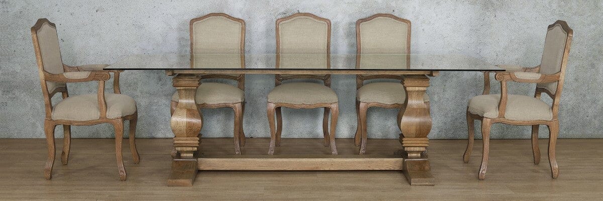 Full view of the Belmont 8 seat dining table set with glass top and Duke chairs.