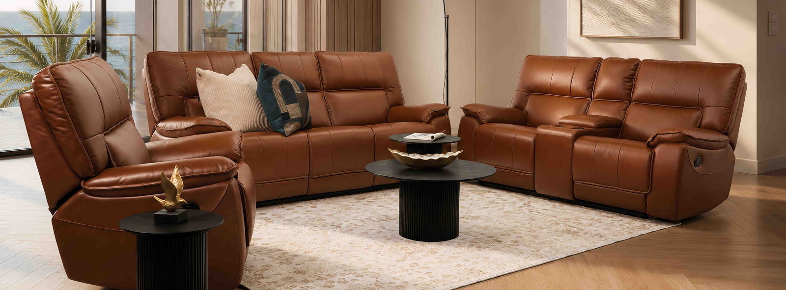 Bentley 3+2+1 Leather Home Theatre Recliner Suite in Imperial Royal Walnut, shown in a coastal inspired interior. | genuine leather couches, recliner couch, lounge suite, brown leather couch
