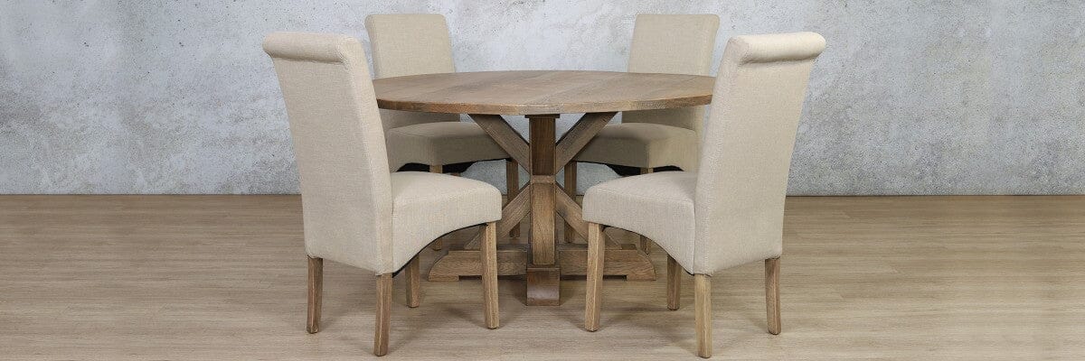 Elegant 4 seater dining set in Antique Natural Oak featuring scrolled back Windsor chairs and X-base table.