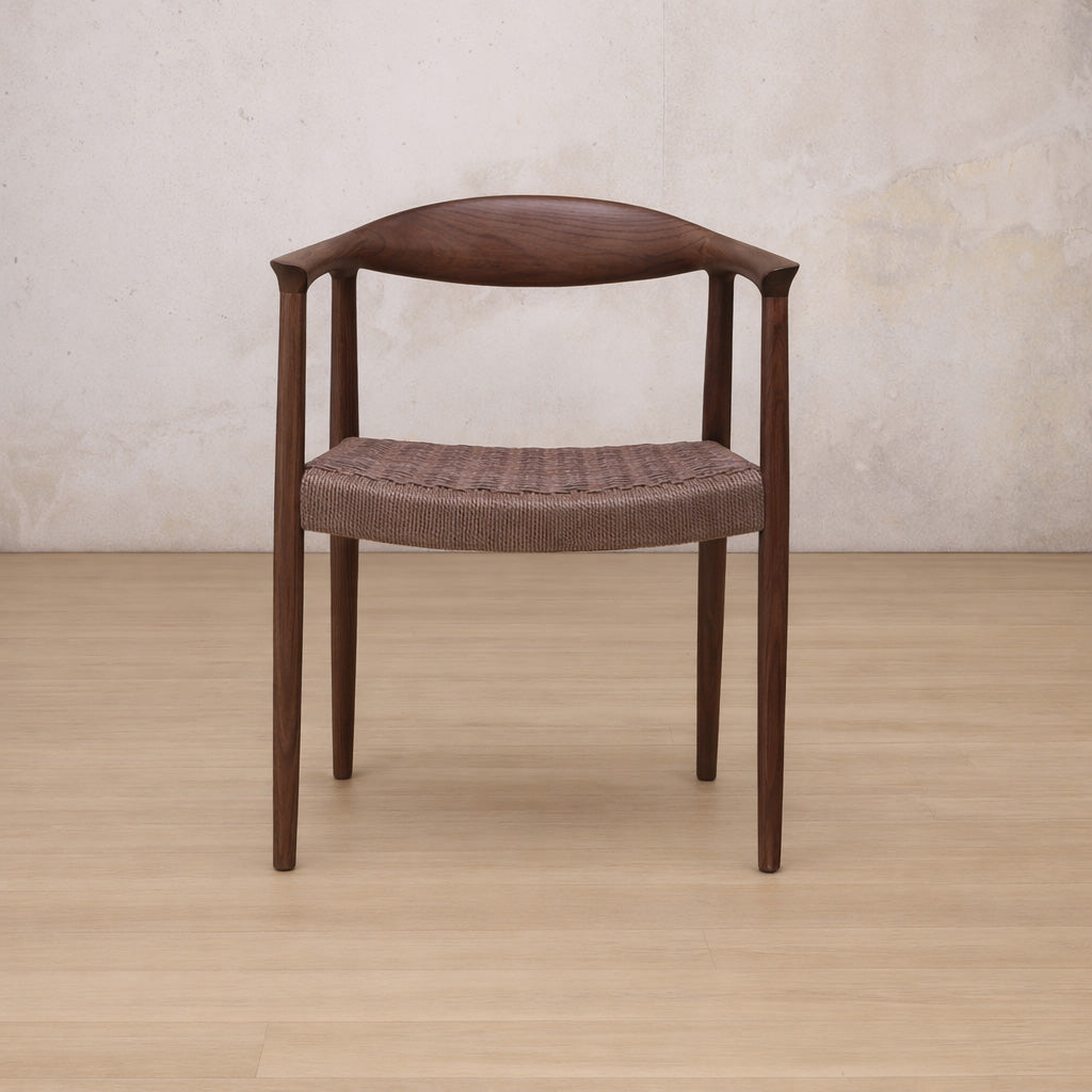 Easton wood dining chair featuring a walnut wood frame and a textured, handwoven rope seat. dining chairs, modern dining chairs, armchairs