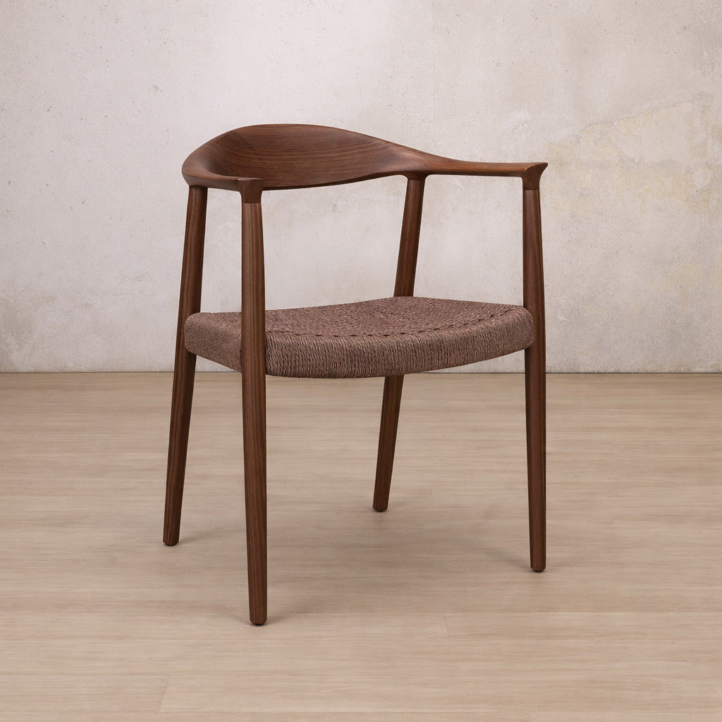 Easton wood dining chair featuring a walnut wood frame and a textured, handwoven rope seat. dining chairs, modern dining chairs, armchairs