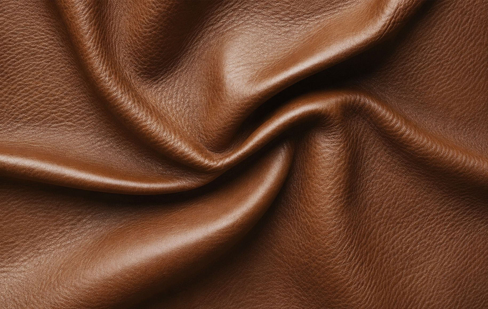 Detailed view of the imperial royal walnut leather showing the natural grain and colour variations of full genuine leather. | couches, leather couches, couches for sale, recliner couches, recliner chair
