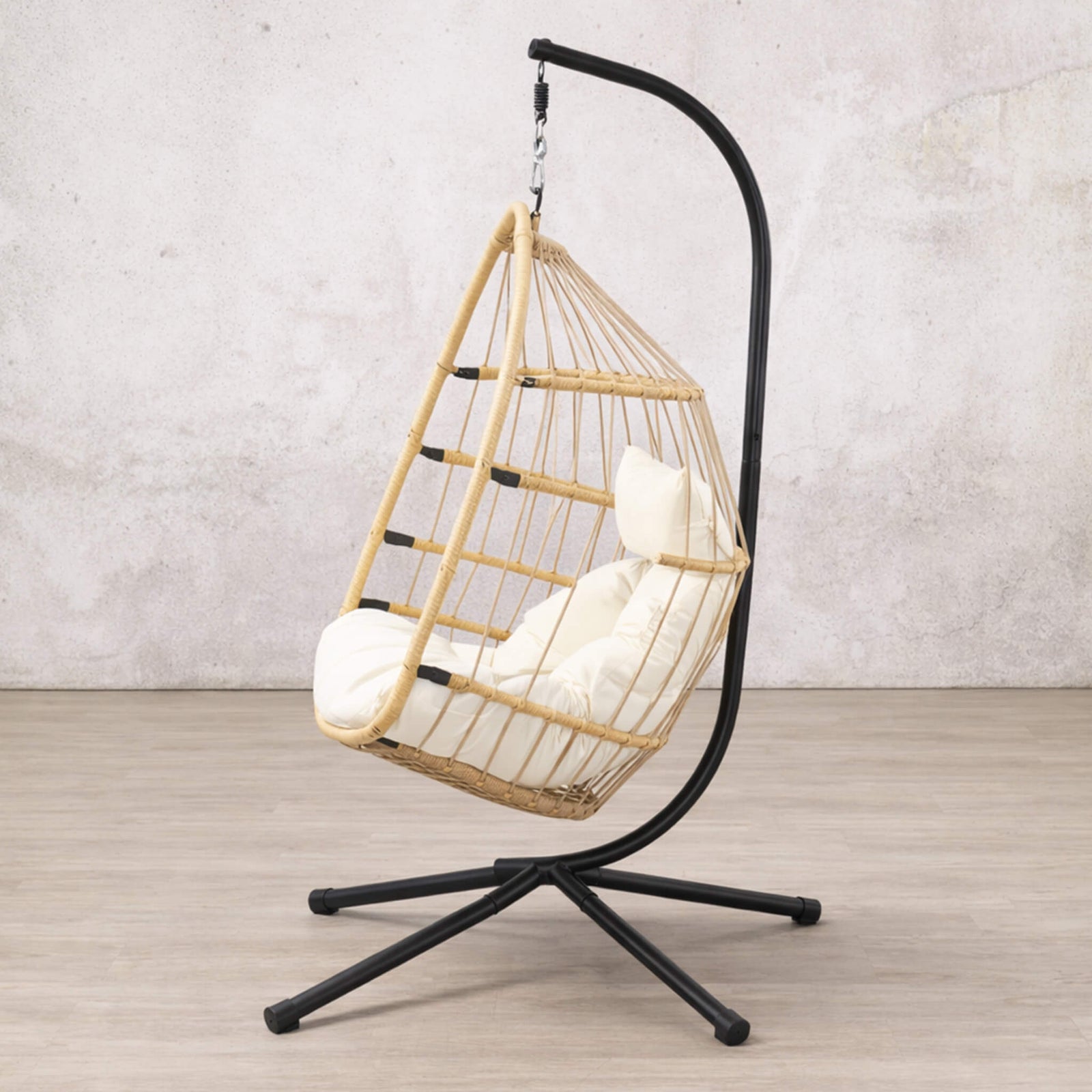 Side view of the beige Madison Hanging Chair | Patio chairs, hanging chairs for sale, hanging chair, outdoor seating