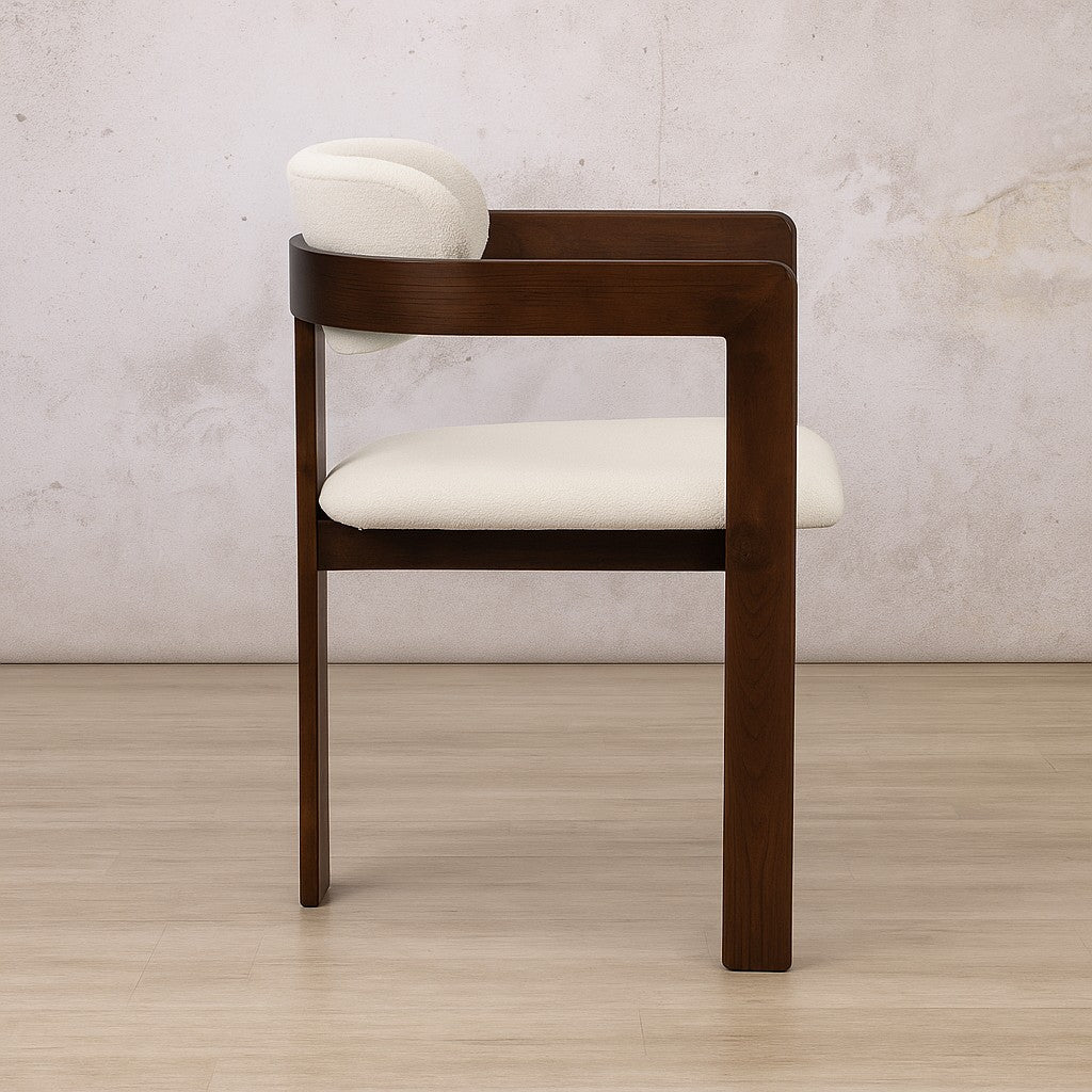 Side profile of the Marlon, showing the ergonomic curve of these carver dining chairs and high back support. | fabric dining chairs, wooden dining chairs, armchairs high back, carver dining chairs