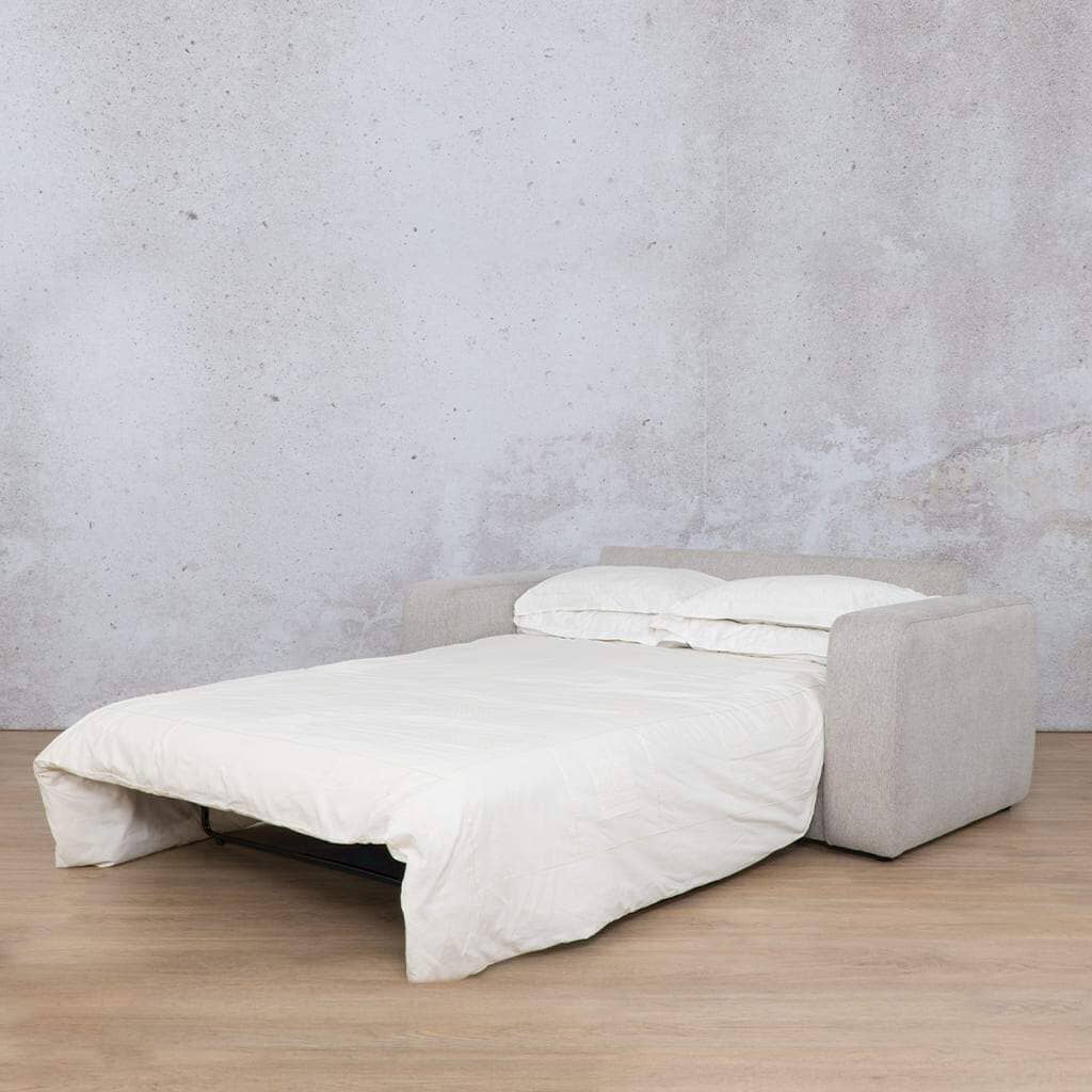 Leather Gallery’s Stanford fabric sleeper couch is set up as a made-up bed for guests, showcasing its versatility as both a stylish sleeper couch and a cosy guest bed. It is ideal for those seeking a practical sleeper couch solution. oyster