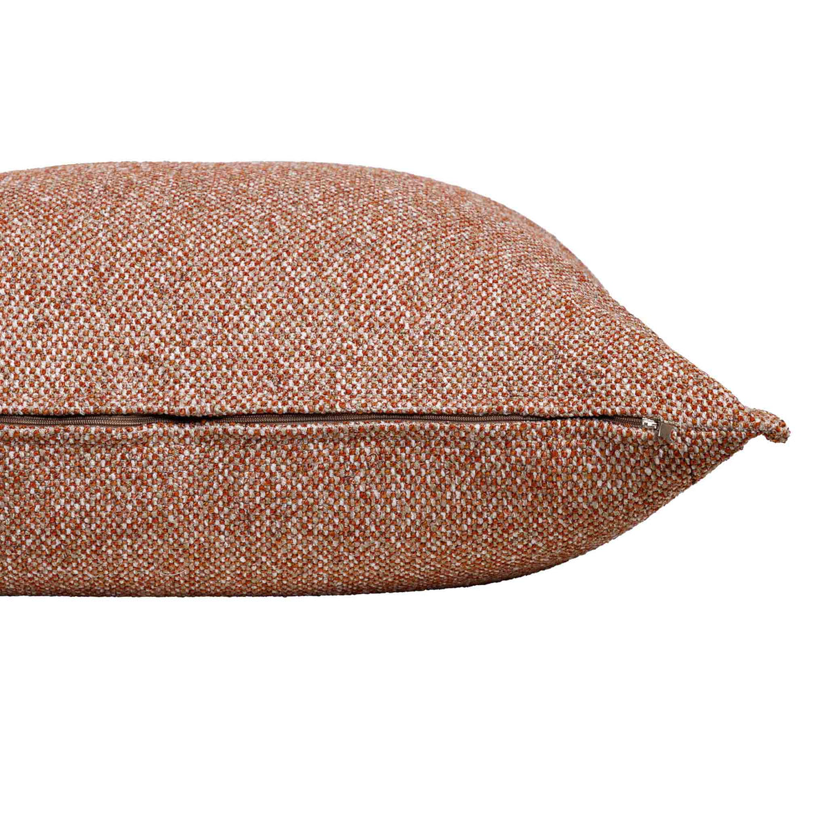 Close-up of the Leather Gallery Aardé Cushion in Sienna Rust, showing the woven fabric, zipper seam, and pointed corner.