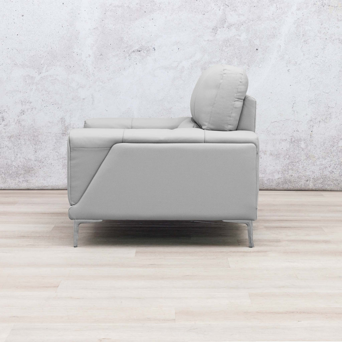 Side view of the Leather Gallery Atlanta 1 Seater Leather Couch in Luxe Beige, featuring a low-profile design and slim metal legs.