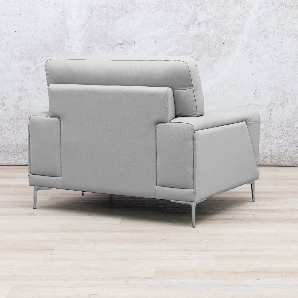 Three-quarter view of the Leather Gallery Atlanta 1 Seater Leather Couch in Luxe Beige, featuring slim metal legs and a modern profile.