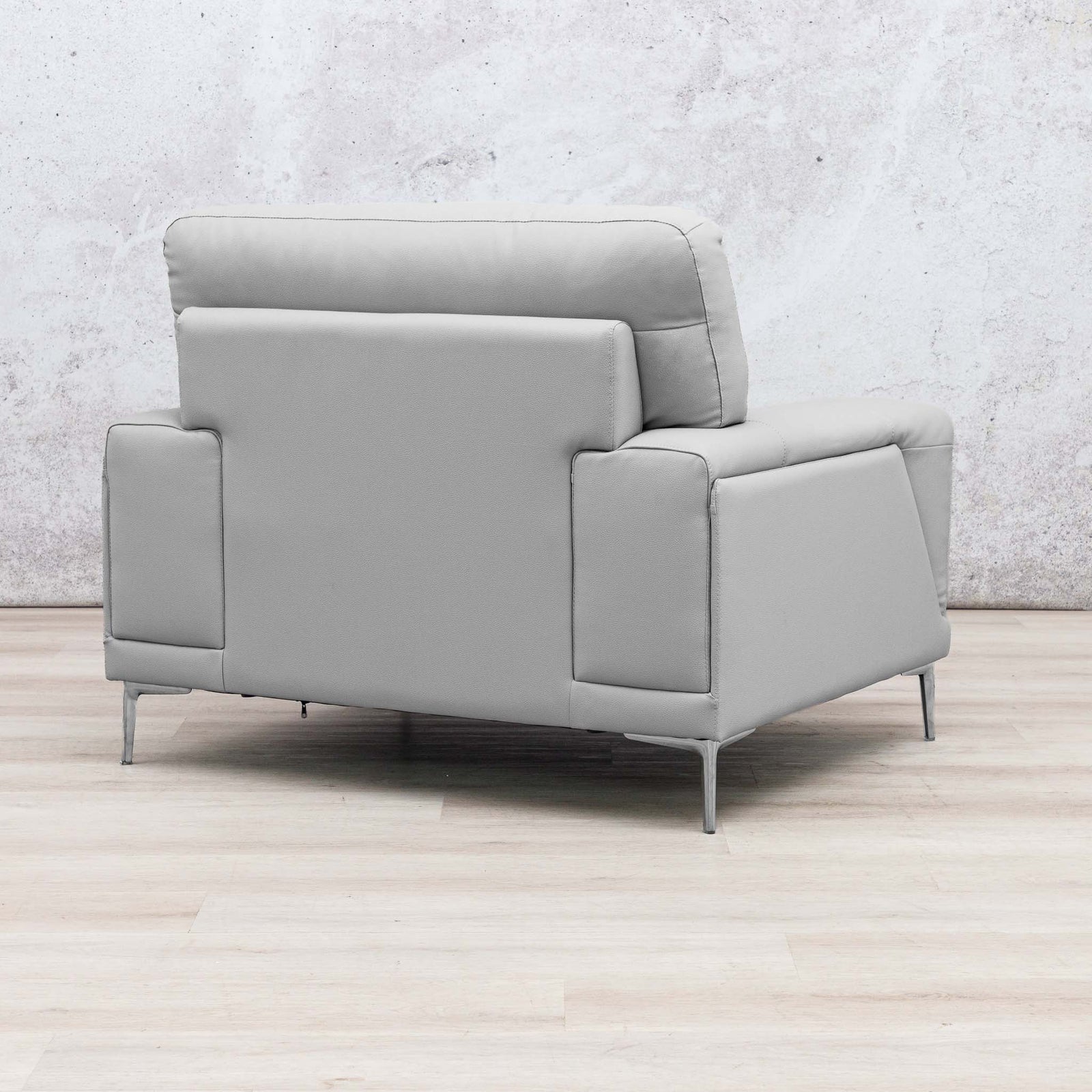 Three-quarter view of the Leather Gallery Atlanta 1 Seater Leather Couch in Luxe Beige, featuring slim metal legs and a modern profile.
