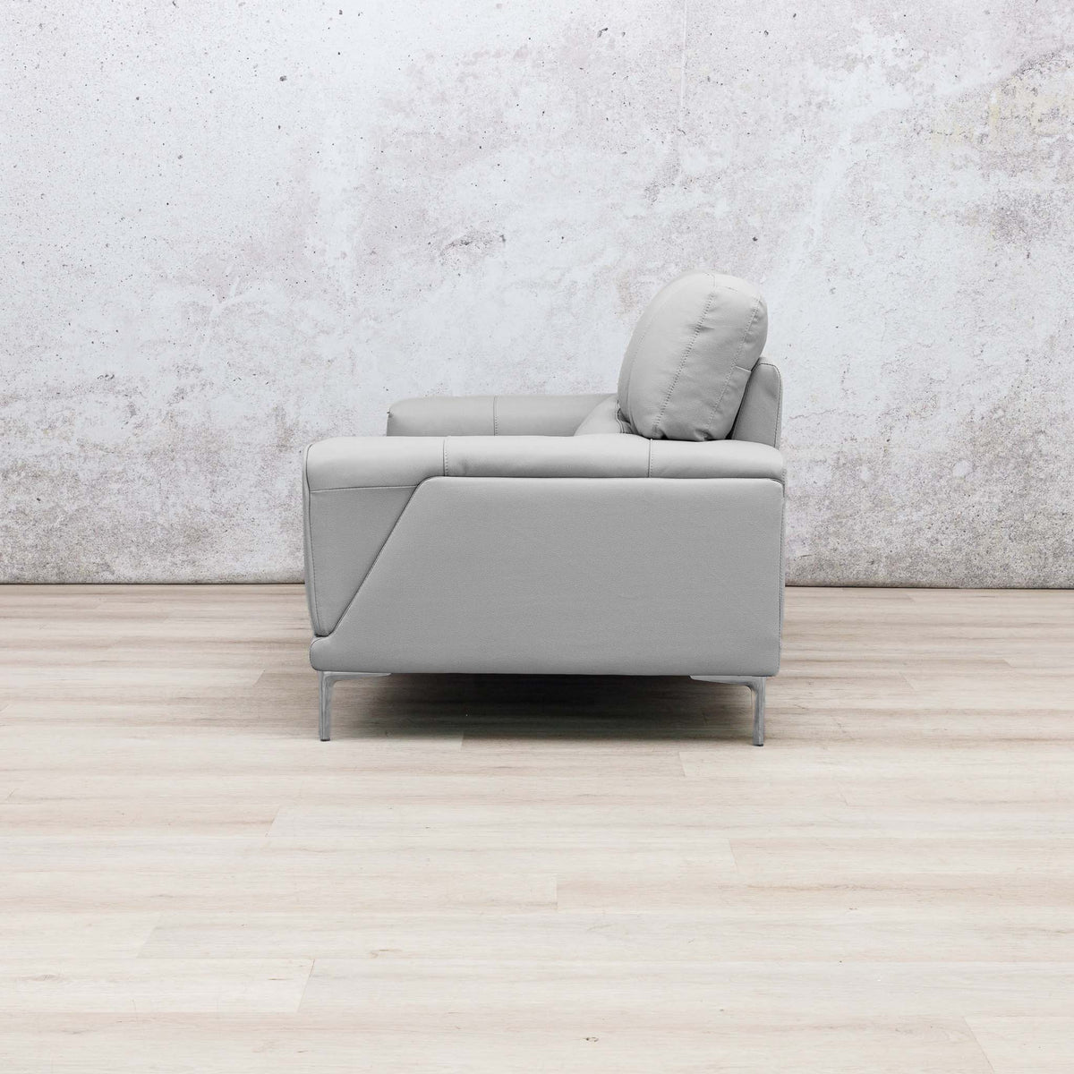 Leather Gallery Atlanta 2 Seater Leather Couch in Luxe Beige, featuring a matching back cushion and slim metal legs.