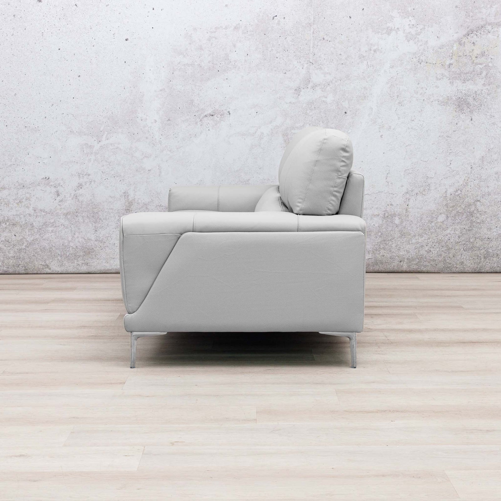 Side view of the Leather Gallery Atlanta 3 Seater Leather Couch in Luxe Beige, featuring slim metal legs and a modern profile.