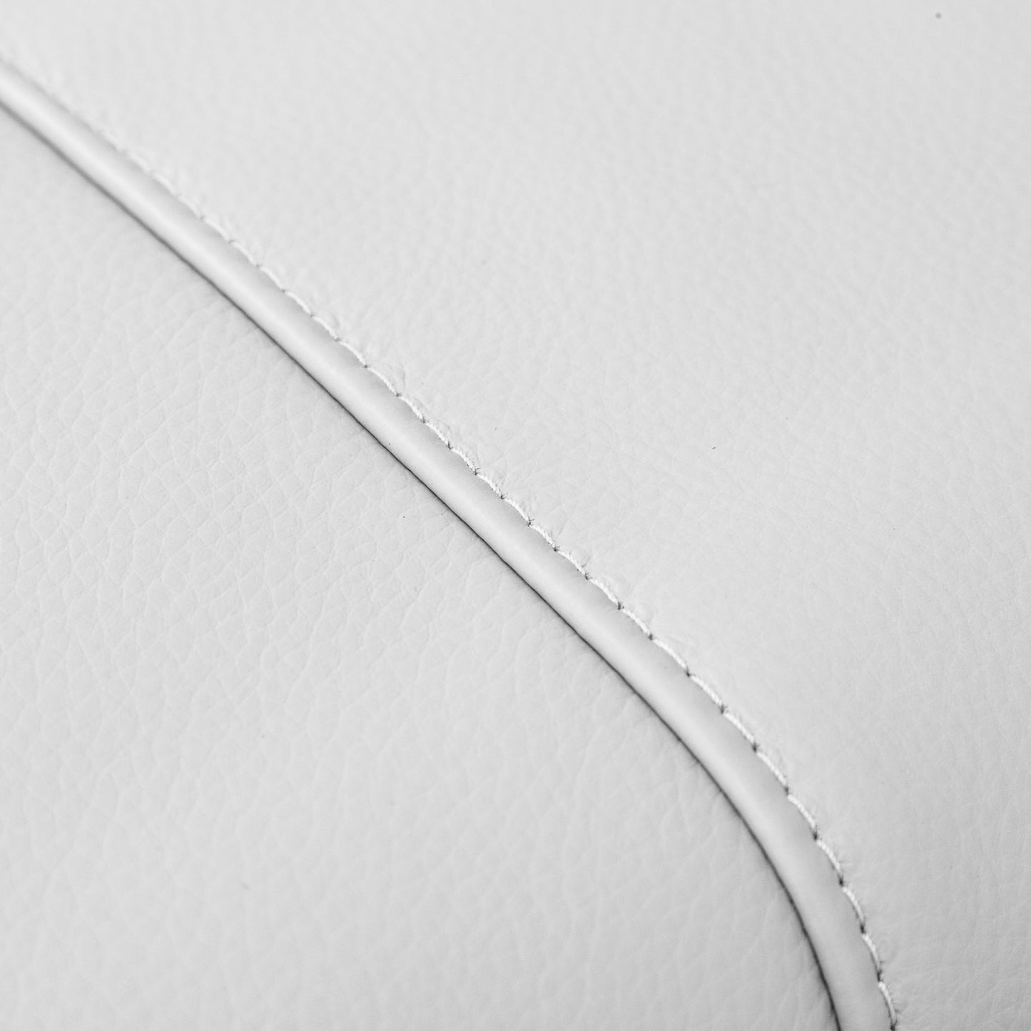 Close-up of the Leather Gallery Atlanta 2 Seater Leather Couch in Luxe Beige, showing the curved stitched leather edge.