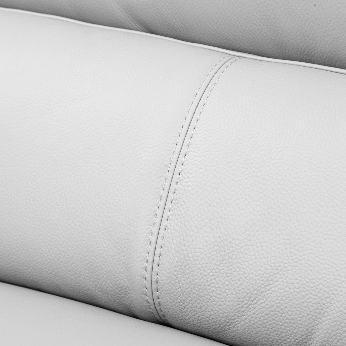 Close-up of the Leather Gallery Atlanta 1 Seater Leather Couch in Luxe Beige, showing pebbled leather texture and curved stitching detail.