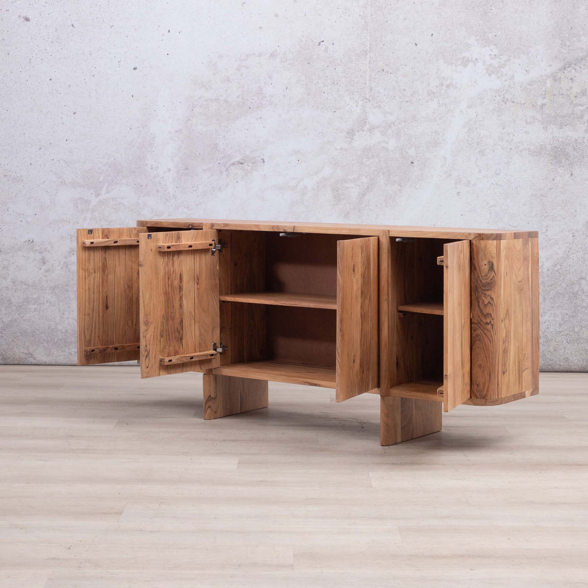 Leather Gallery Baltic Sideboard in Acacia wood, shown with open doors revealing internal shelving compartments.
