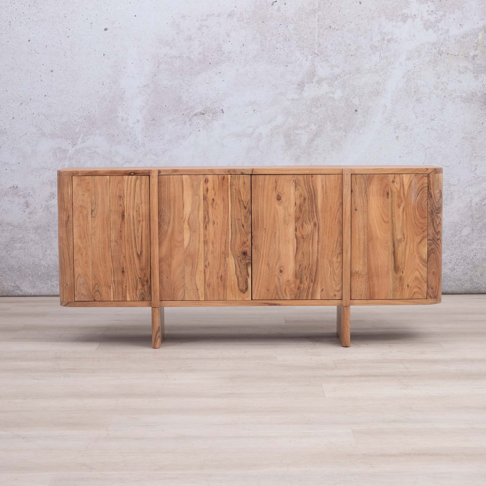 Leather Gallery Baltic Sideboard in Acacia wood, featuring four doors, a warm natural finish, and tapered legs.