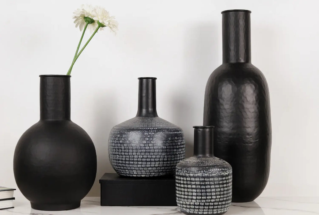 Browse beautifully crafted metal vases to complement your interior style.