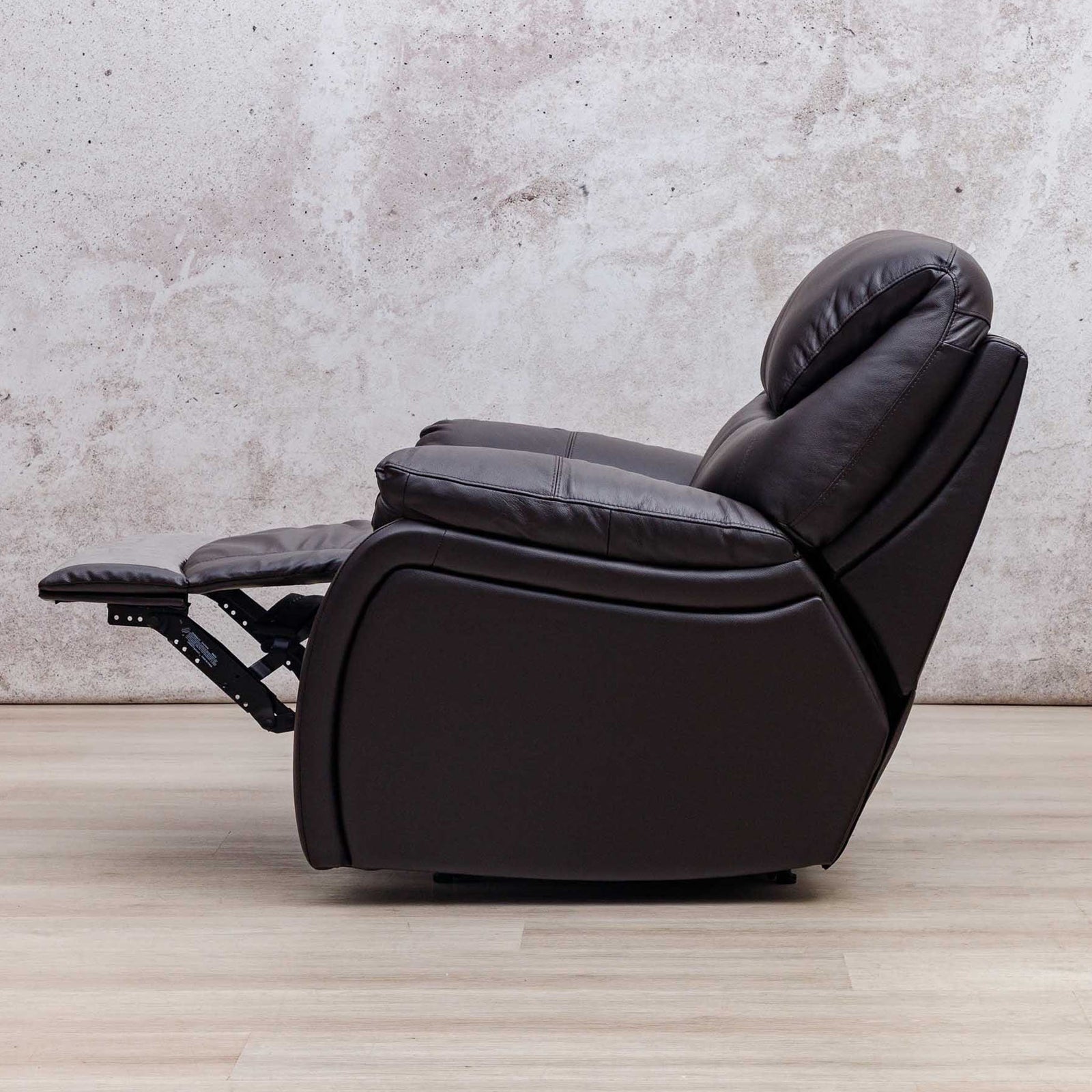 Side view of the Leather Gallery Cairo 1 Seater Leather Recliner in Choc, shown with the footrest extended.