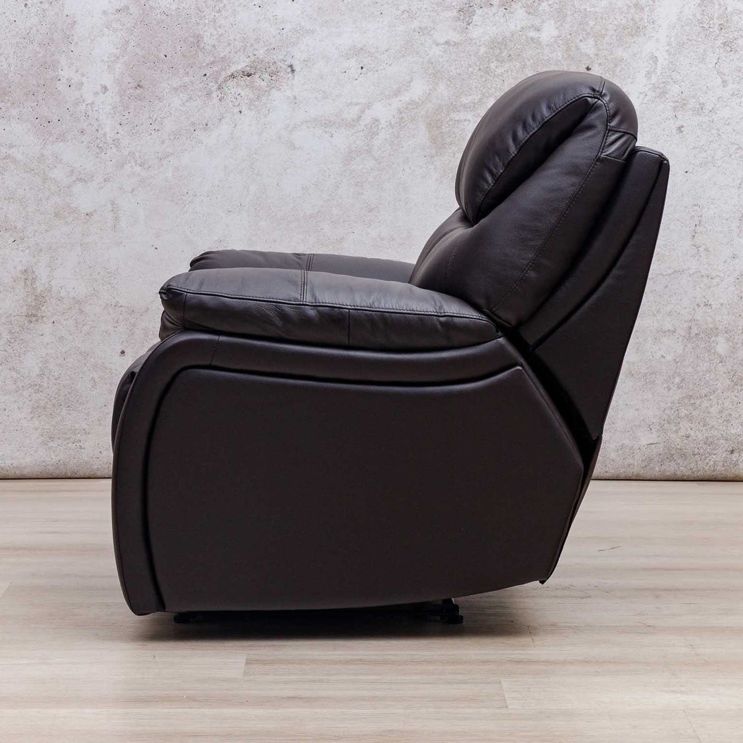 Side view of the Leather Gallery Cairo 1 Seater Leather Recliner in Choc, showing its leather upholstery and recliner profile.