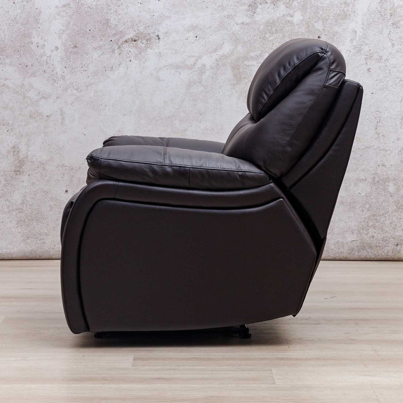 Side view of the Leather Gallery Cairo 1 Seater Leather Recliner in Choc, showing its leather upholstery and recliner profile.