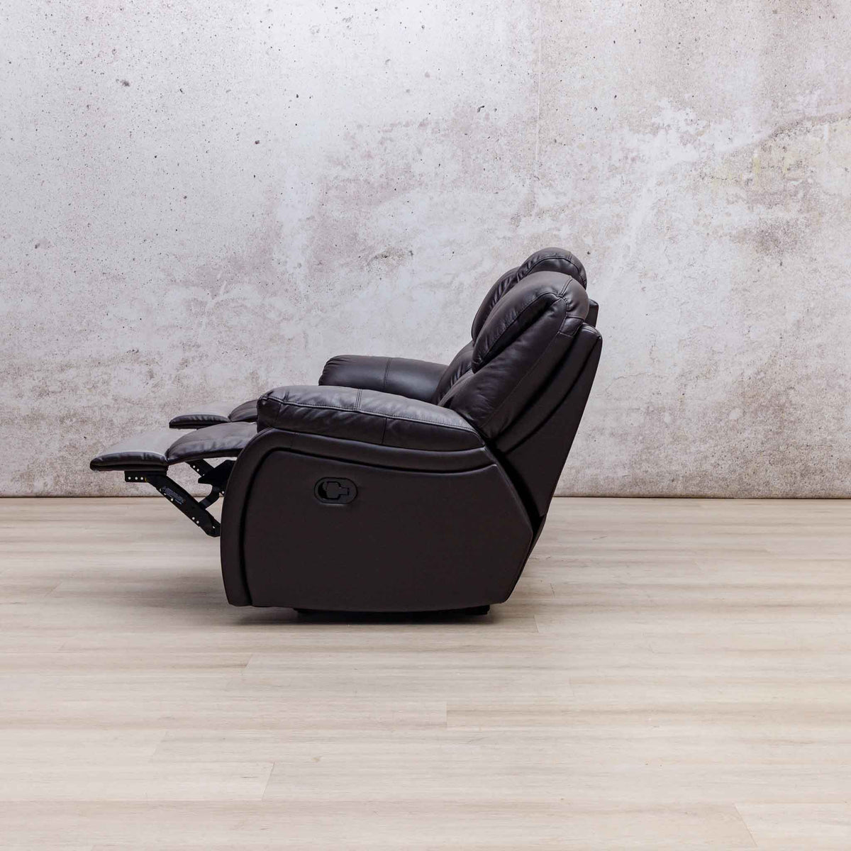 Side view of the Leather Gallery Cairo 3 Seater Leather Recliner in Choc, shown with the footrest extended.