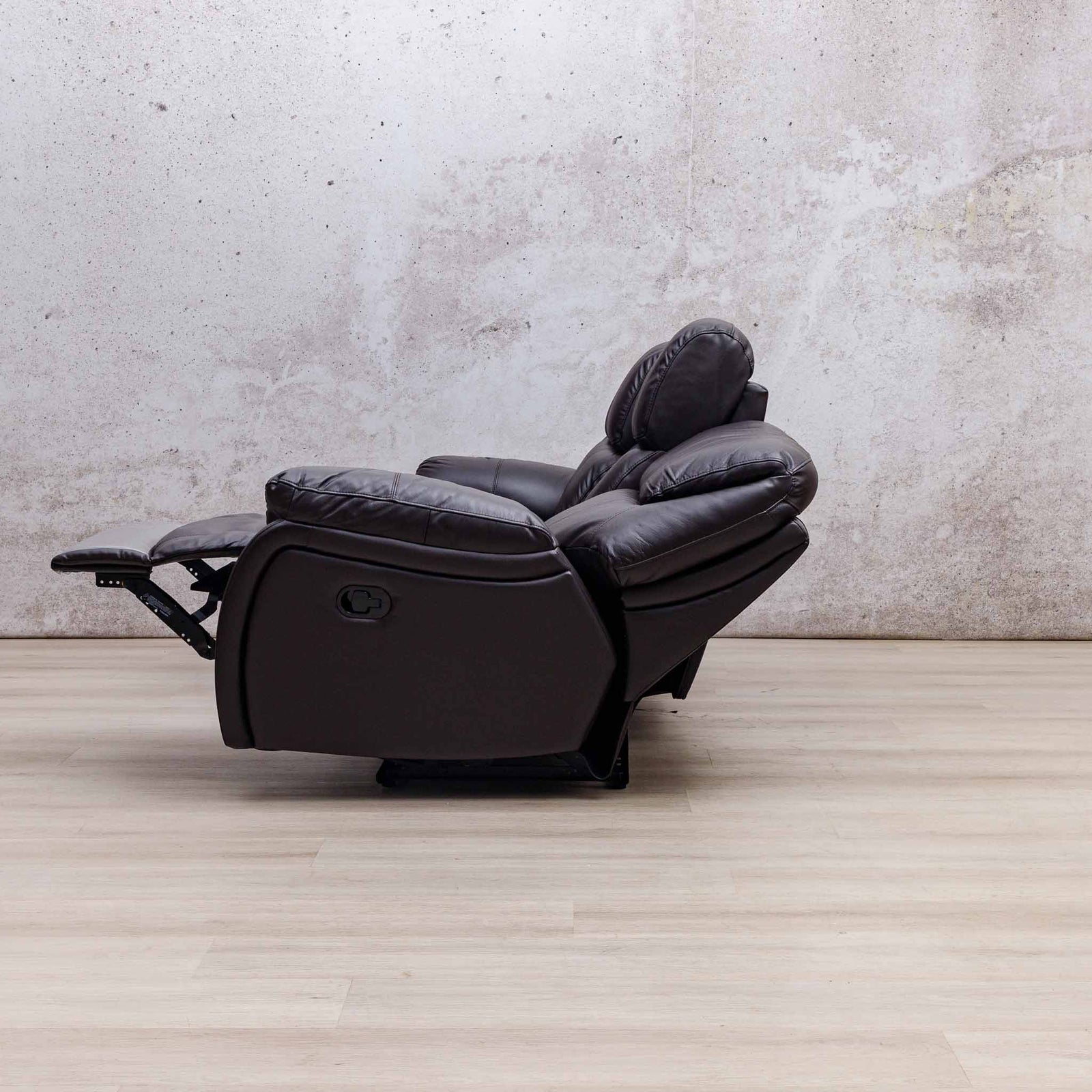 Side view of the Leather Gallery Cairo 3 Seater Leather Recliner in Choc, shown with the footrest extended.