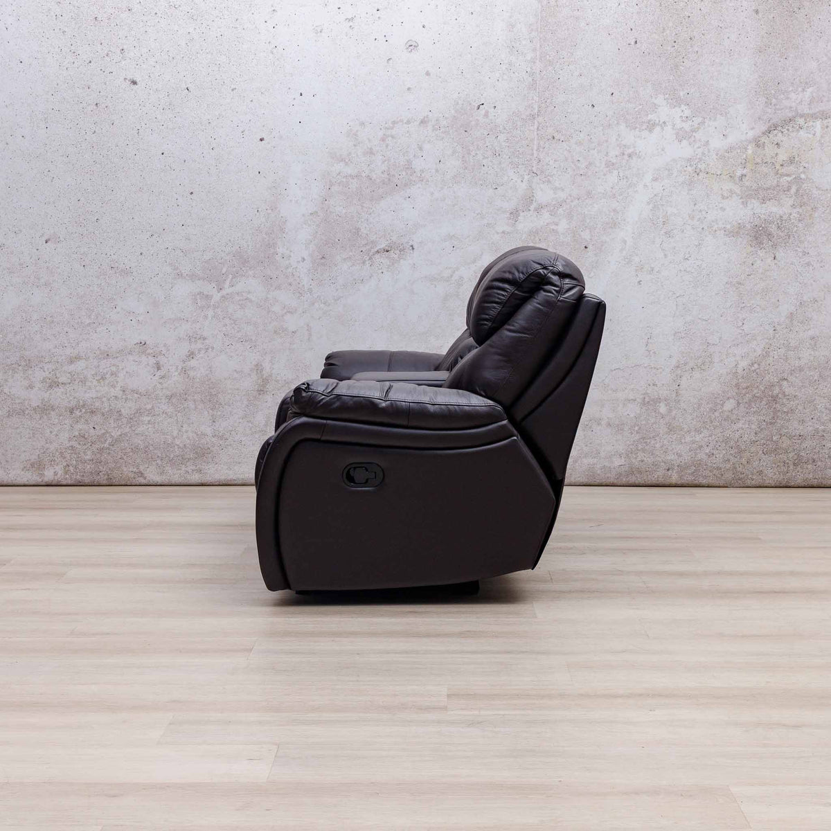 Side view of the Leather Gallery Cairo 2 Seater Leather Recliner in Choc, showing its leather upholstery and recliner profile.