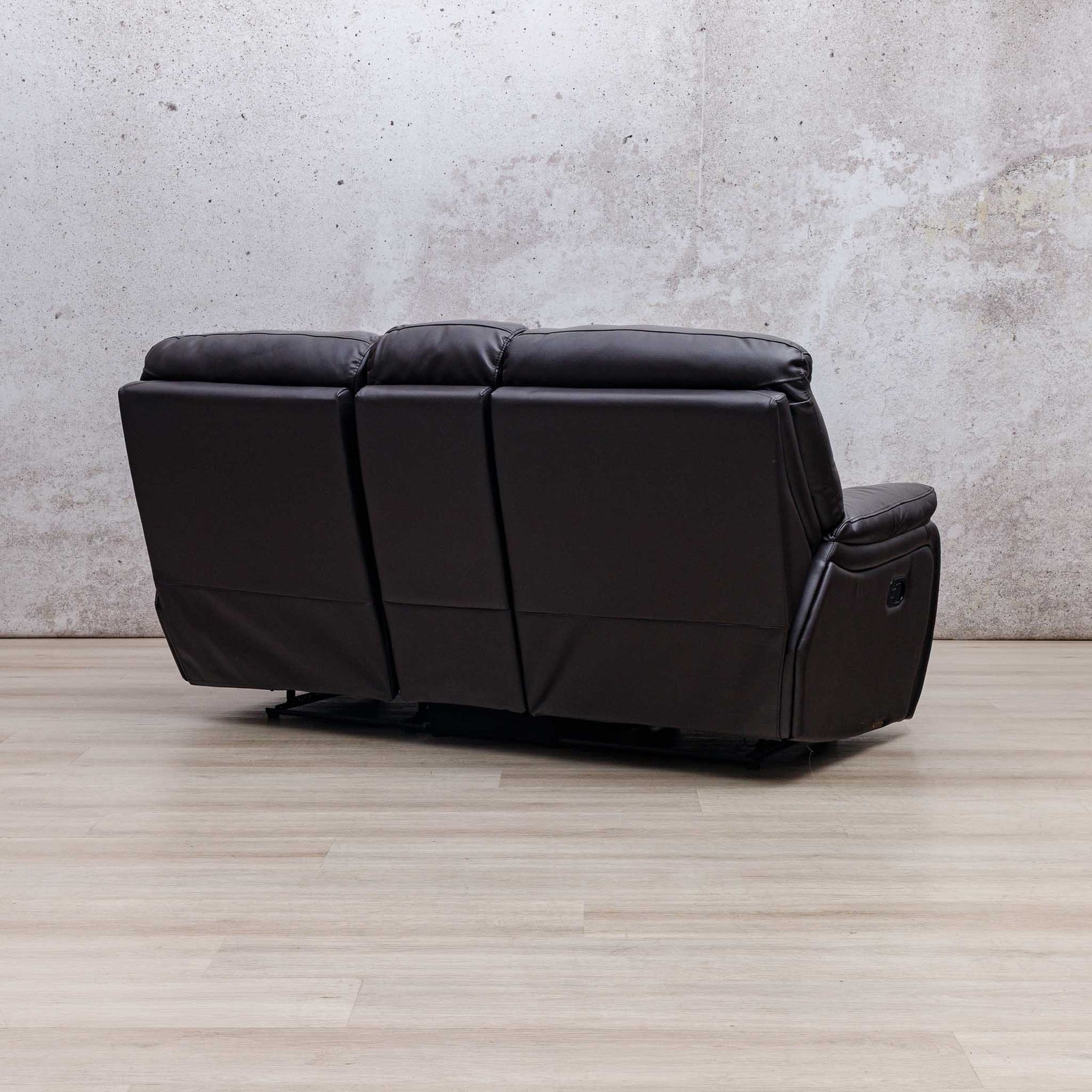 Rear three-quarter view of the Leather Gallery Cairo 2 Seater Leather Recliner in Choc, showing its reclining design and leather upholstery.