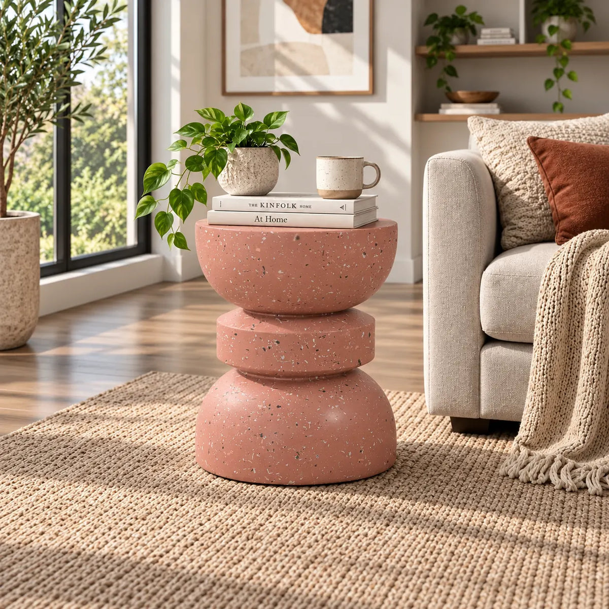 Gallery Everyday Caldera Side Table in Terracotta, featuring a stacked sculptural design with a speckled stone-look finish.