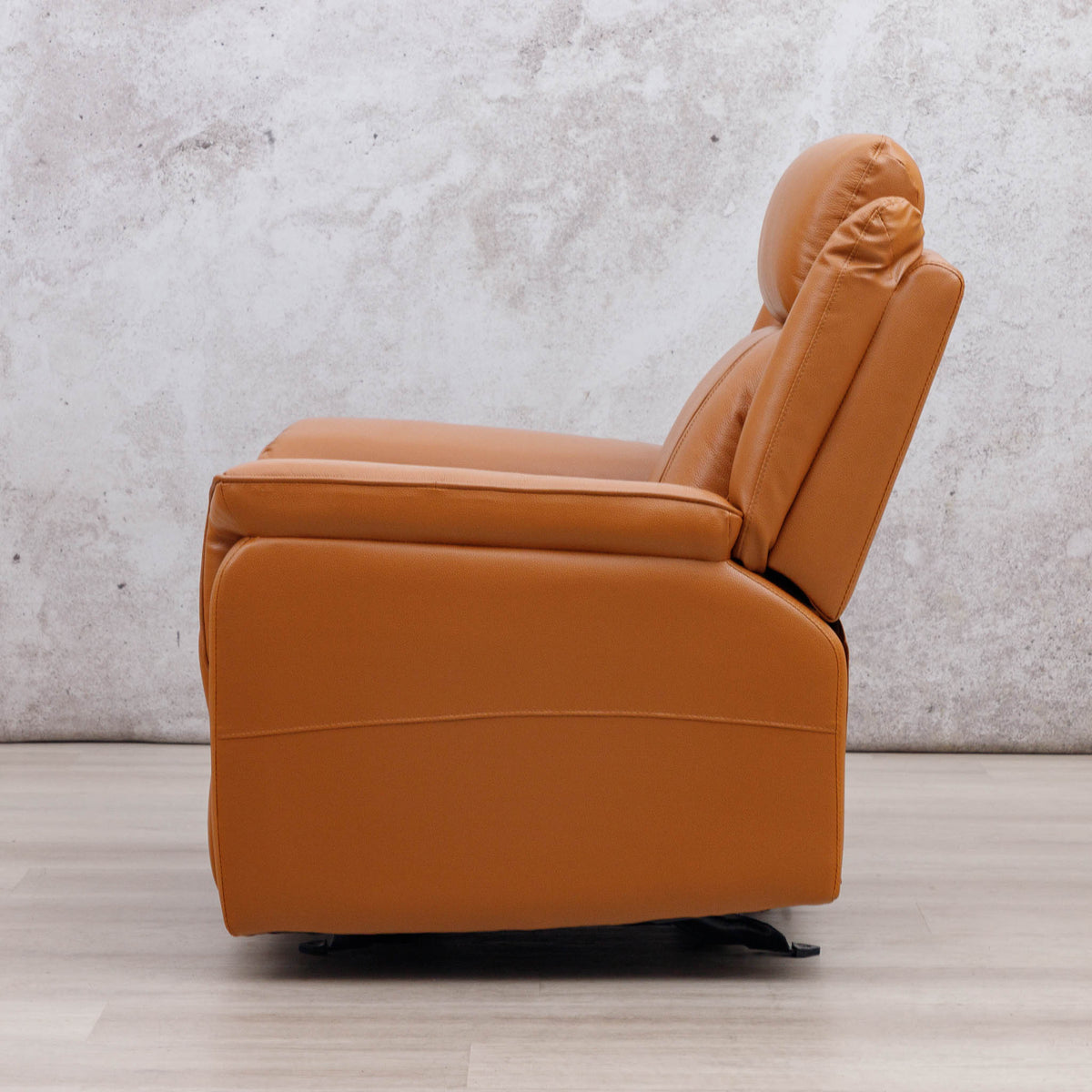 Side view of the Leather Gallery Carter 1 Seater Leather Recliner Chair in Tan, showing its smooth leather upholstery and power recliner profile.