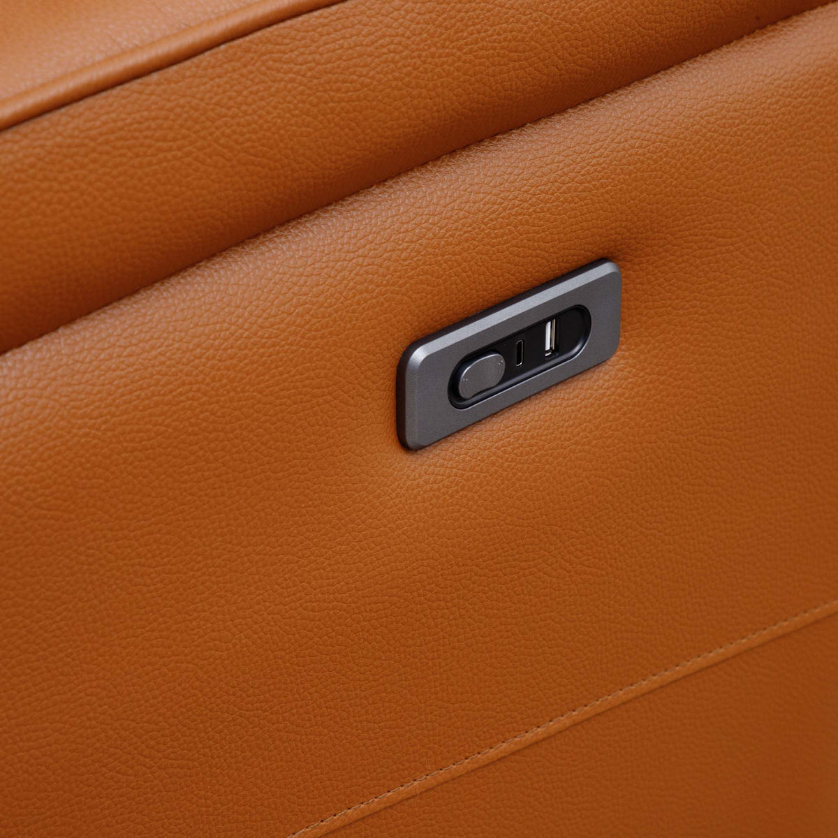 Close-up of the Leather Gallery Carter 1 Seater Leather Recliner Chair in Tan, showing the control panel and USB-C charging port.