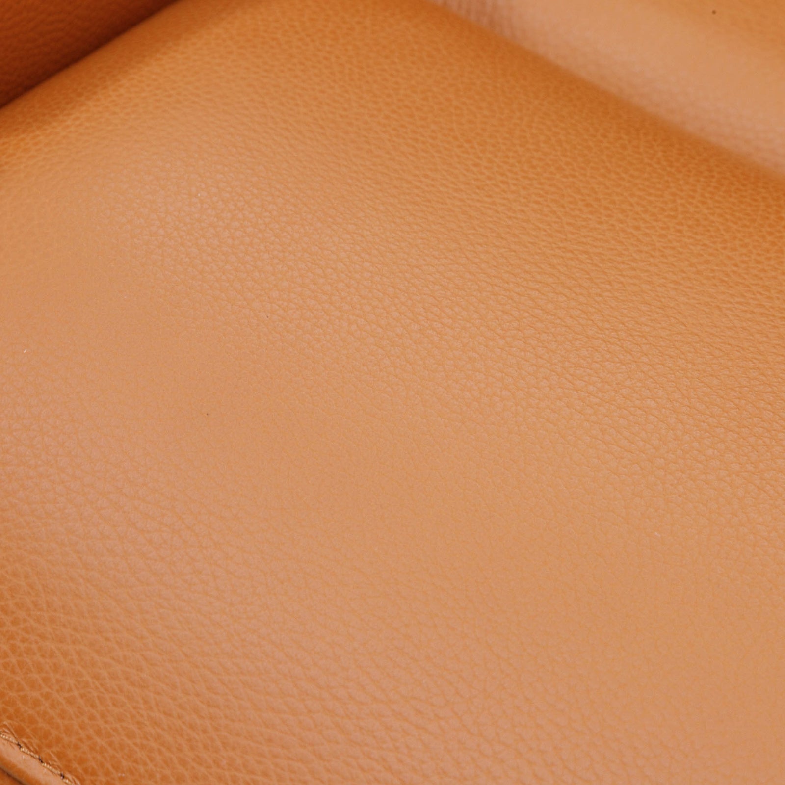 Close-up of the Leather Gallery Carter 1 Seater Leather Recliner Chair in Tan, showing the smooth pebbled leather texture.