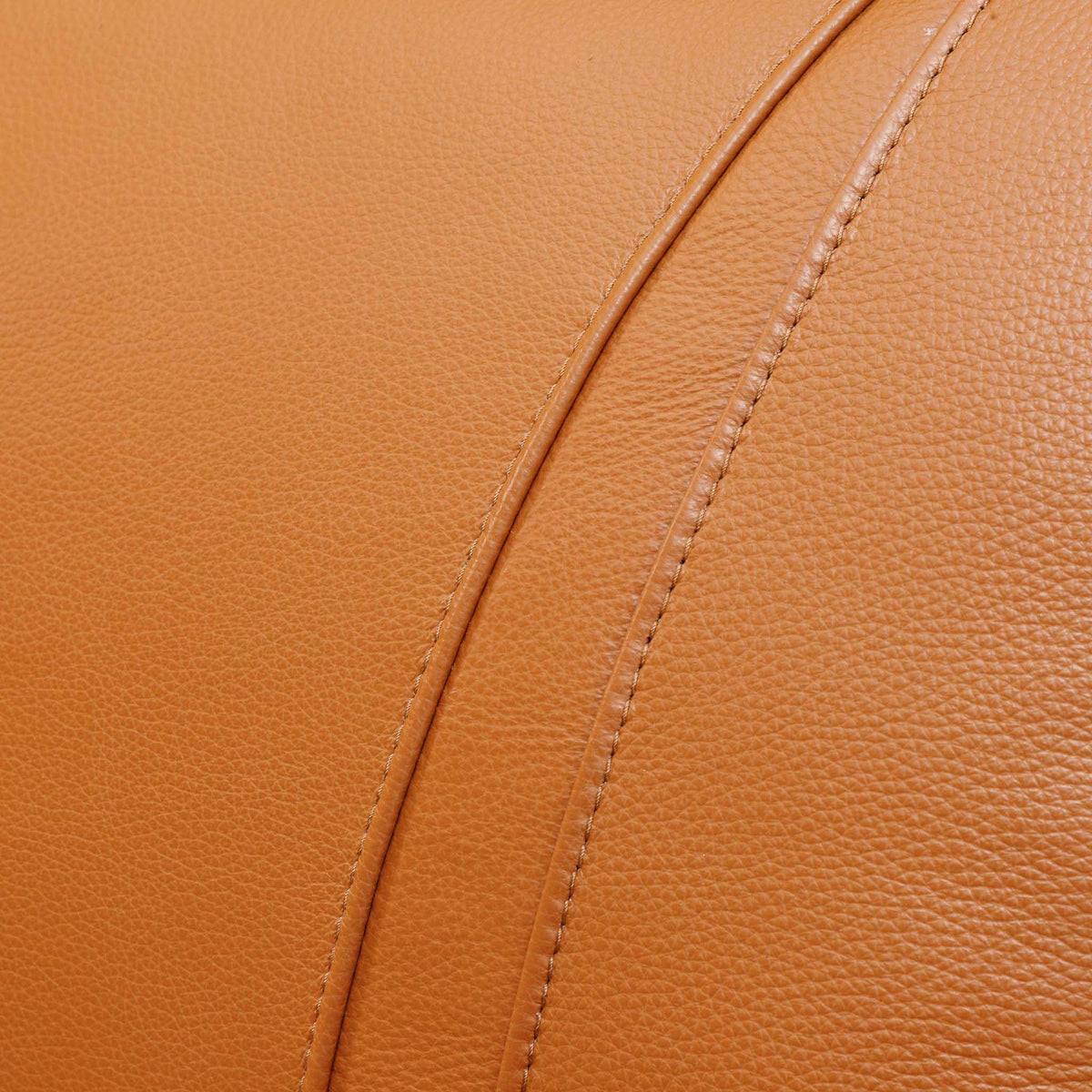 Close-up of the Leather Gallery Carter 1 Seater Leather Recliner Chair in Tan, showing pebbled leather texture and parallel stitched seams.