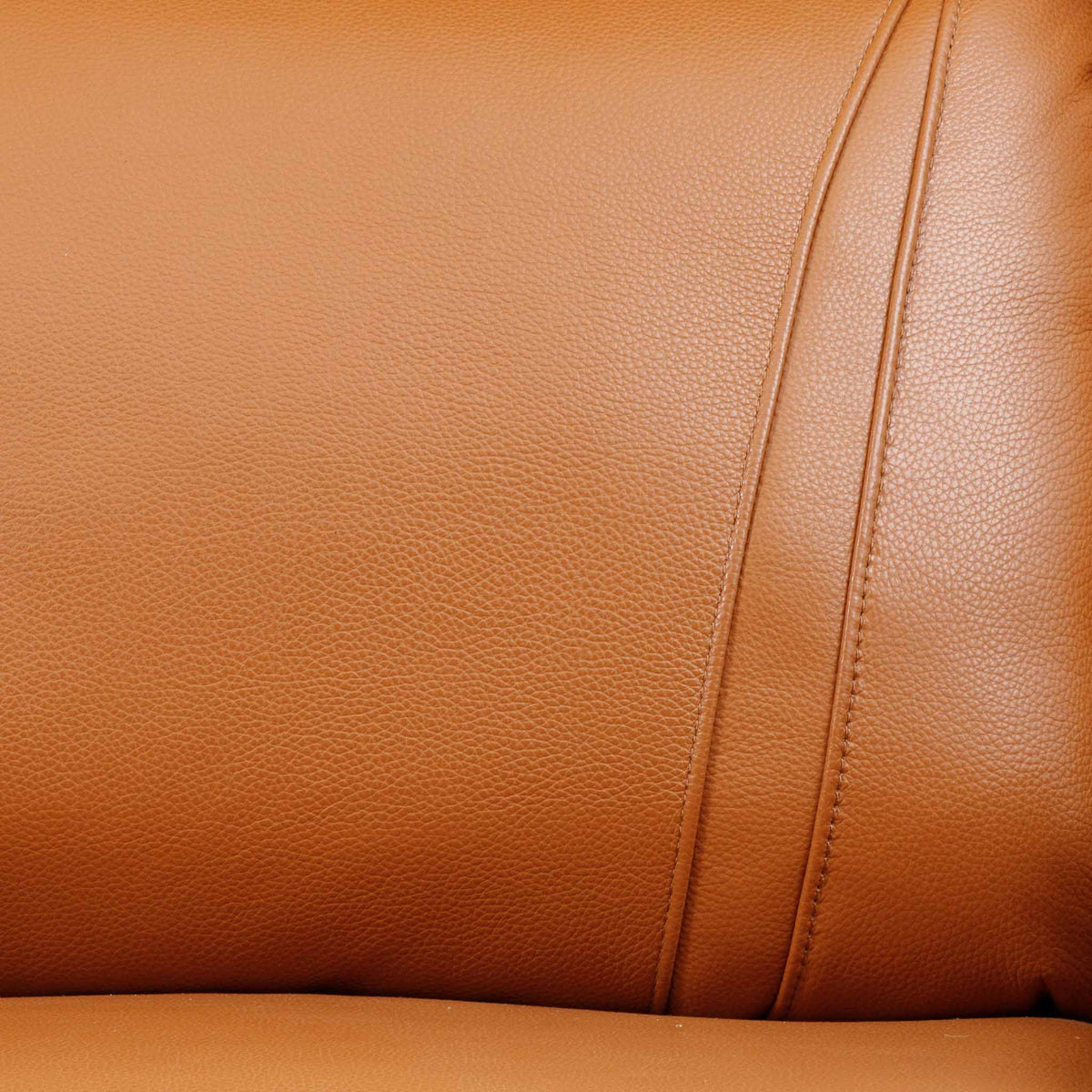 Close-up of the Leather Gallery Carter 1 Seater Leather Recliner Chair in Tan, showing the leather grain and stitched panel seams.