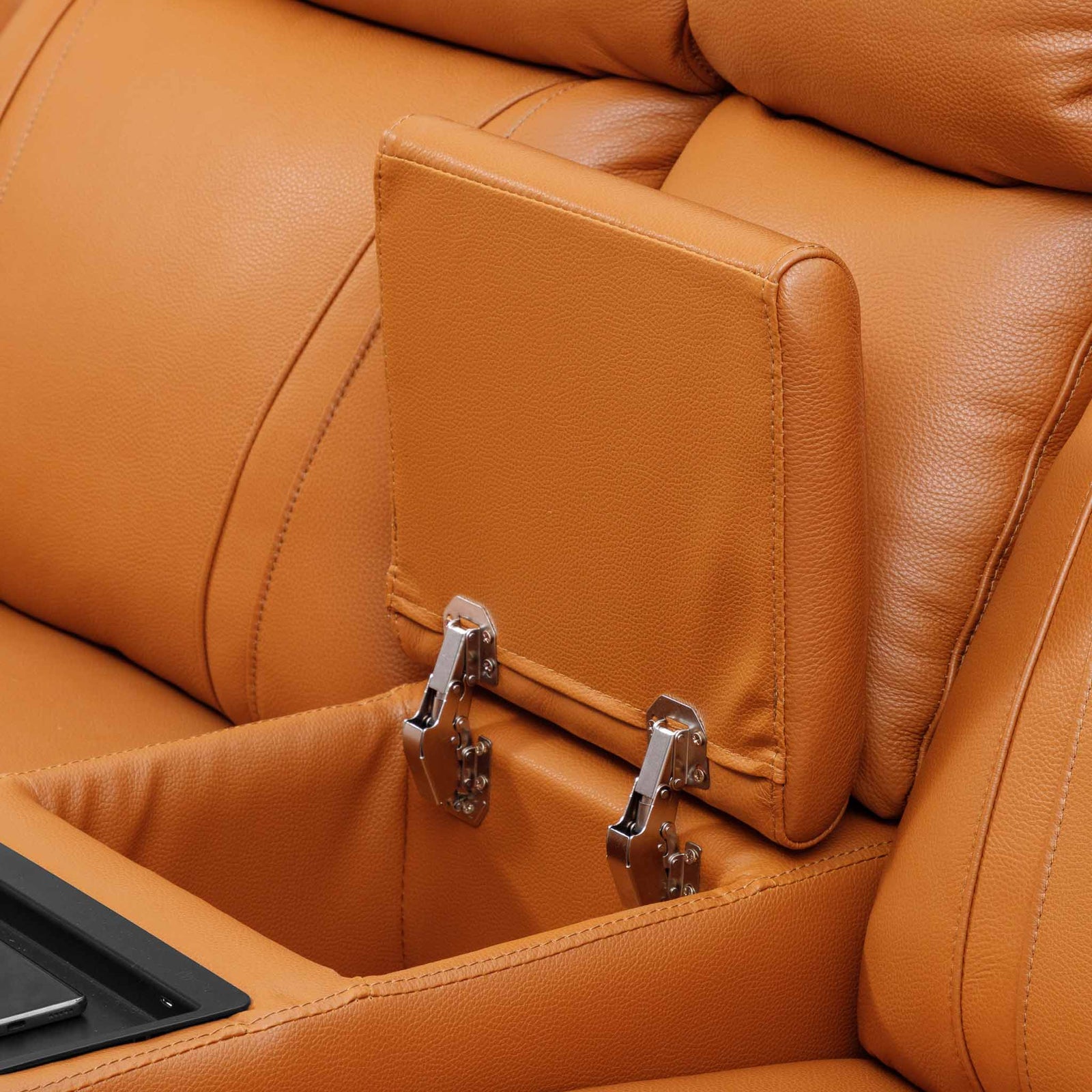 Close-up of the Leather Gallery Carter 1 Seater Leather Recliner Chair in Tan, showing the fold-down armrest storage and silver metal hinges.