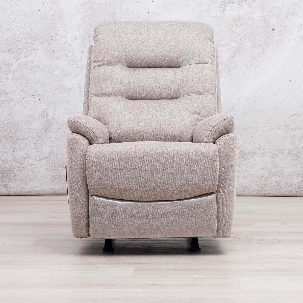 Close-up of the Leather Gallery Dallas Fabric Rocker Recliner Chair in Beige, showing woven fabric texture and visible stitching.