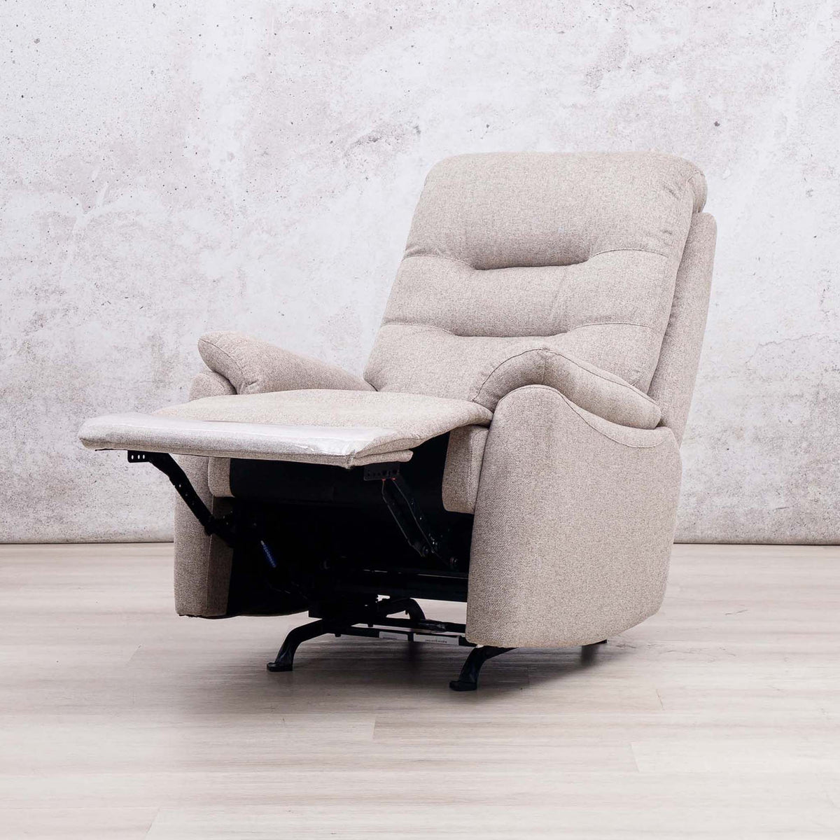 Leather Gallery Dallas Fabric Rocker Recliner Chair in Beige, shown with the footrest extended.