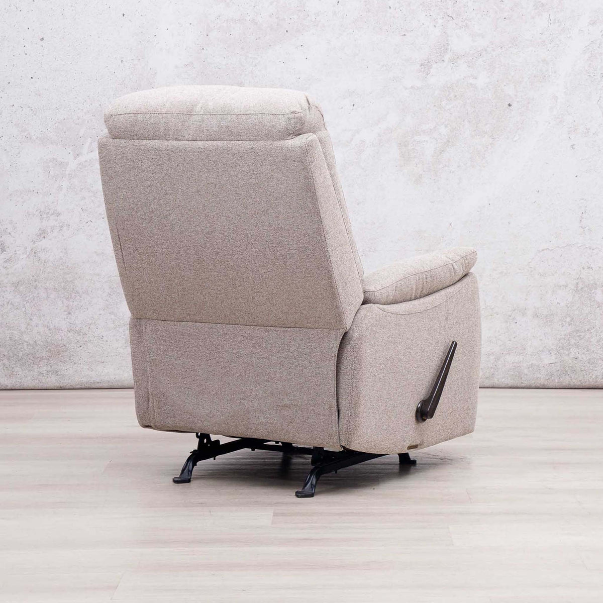 Leather Gallery Dallas Fabric Rocker Recliner Chair in Beige, featuring a black swivel base and footrest.