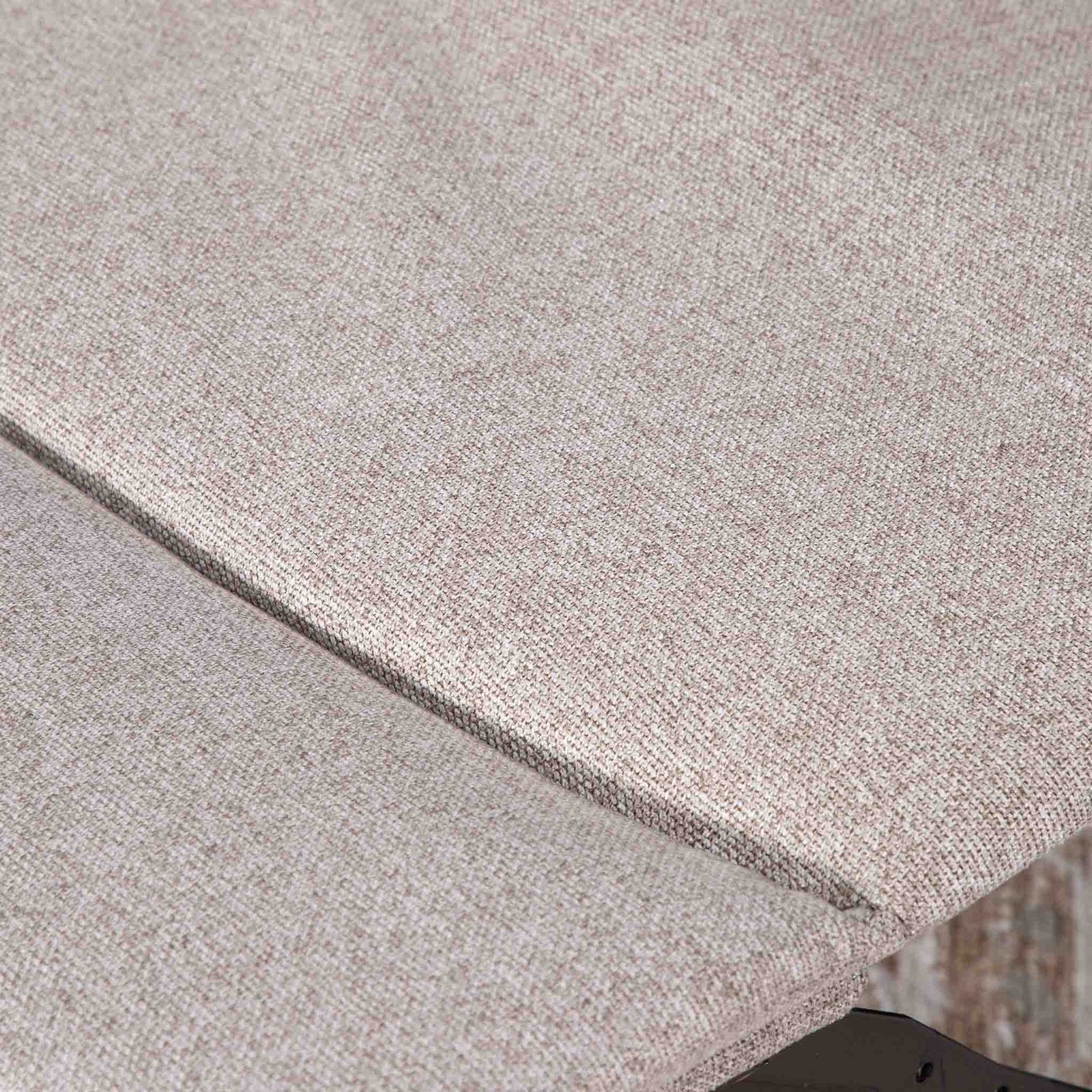 Close-up of the Leather Gallery Dallas Fabric Rocker Recliner Chair in Beige, showing the woven upholstery texture and folded seam detail.