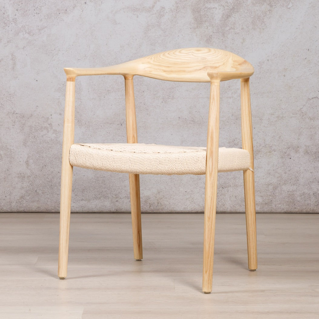 Easton wood dining chair featuring a natural ash wood frame and a textured, handwoven rope seat. dining chairs, modern dining chairs, armchairs